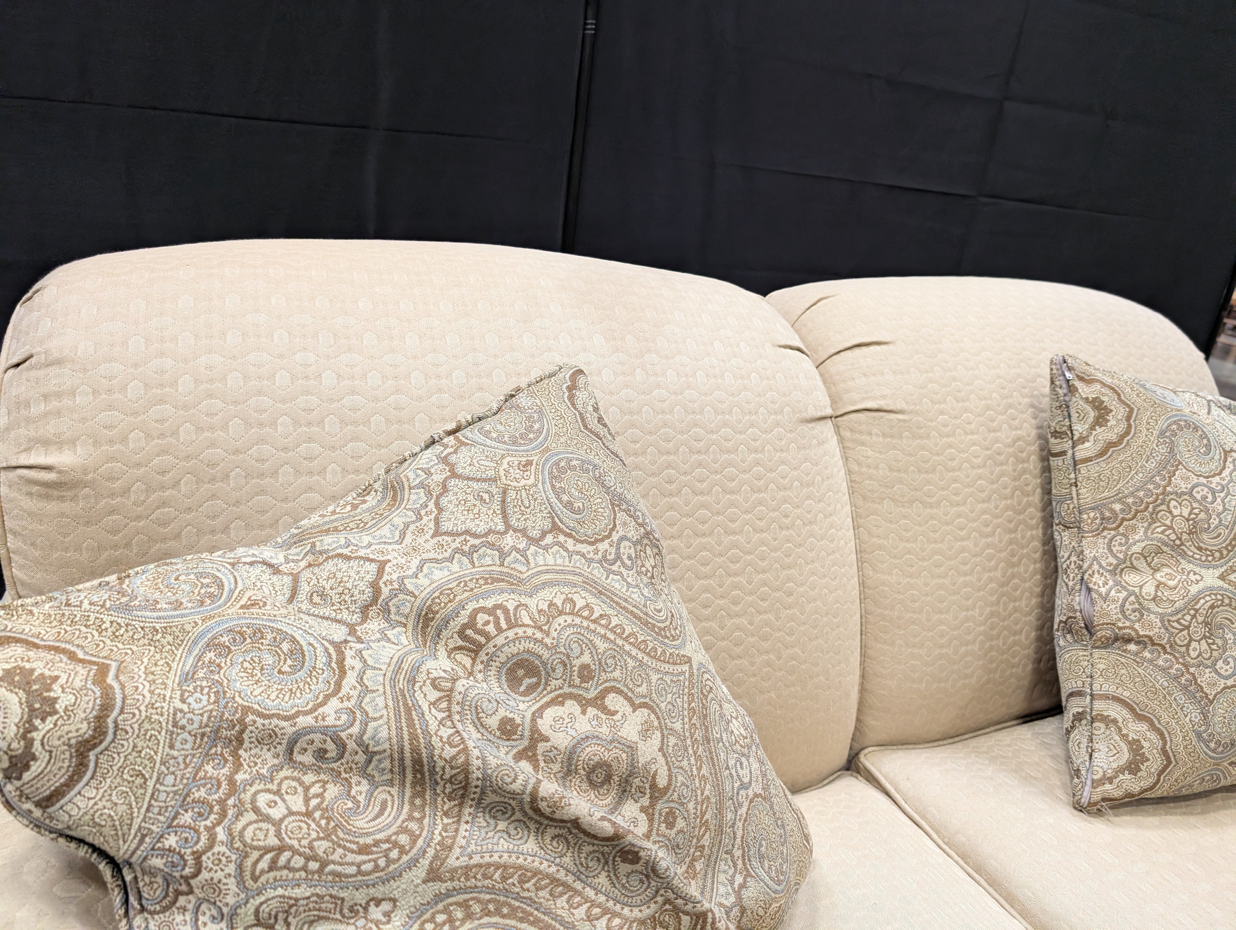 Classic Tan Two-Seater Sofa with Rolled Arms