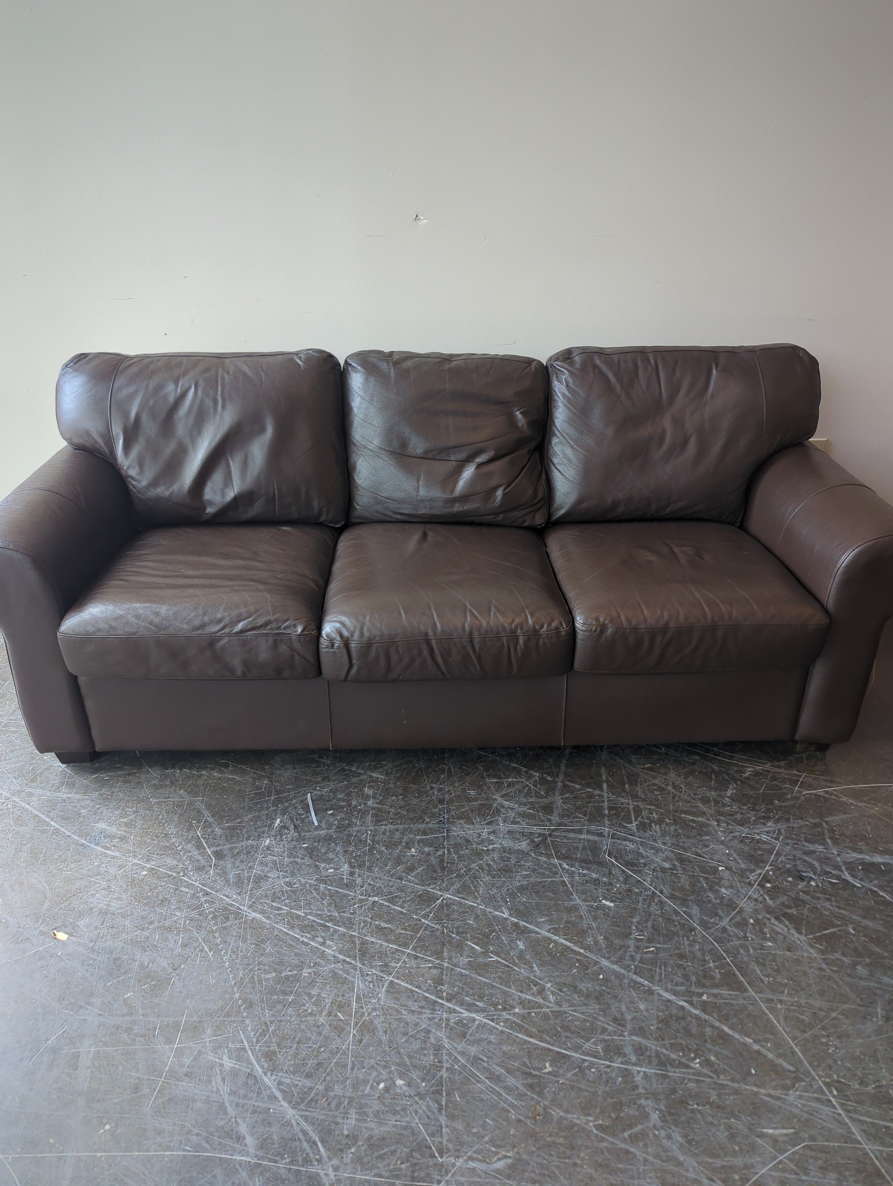 Brown Three Seater couch