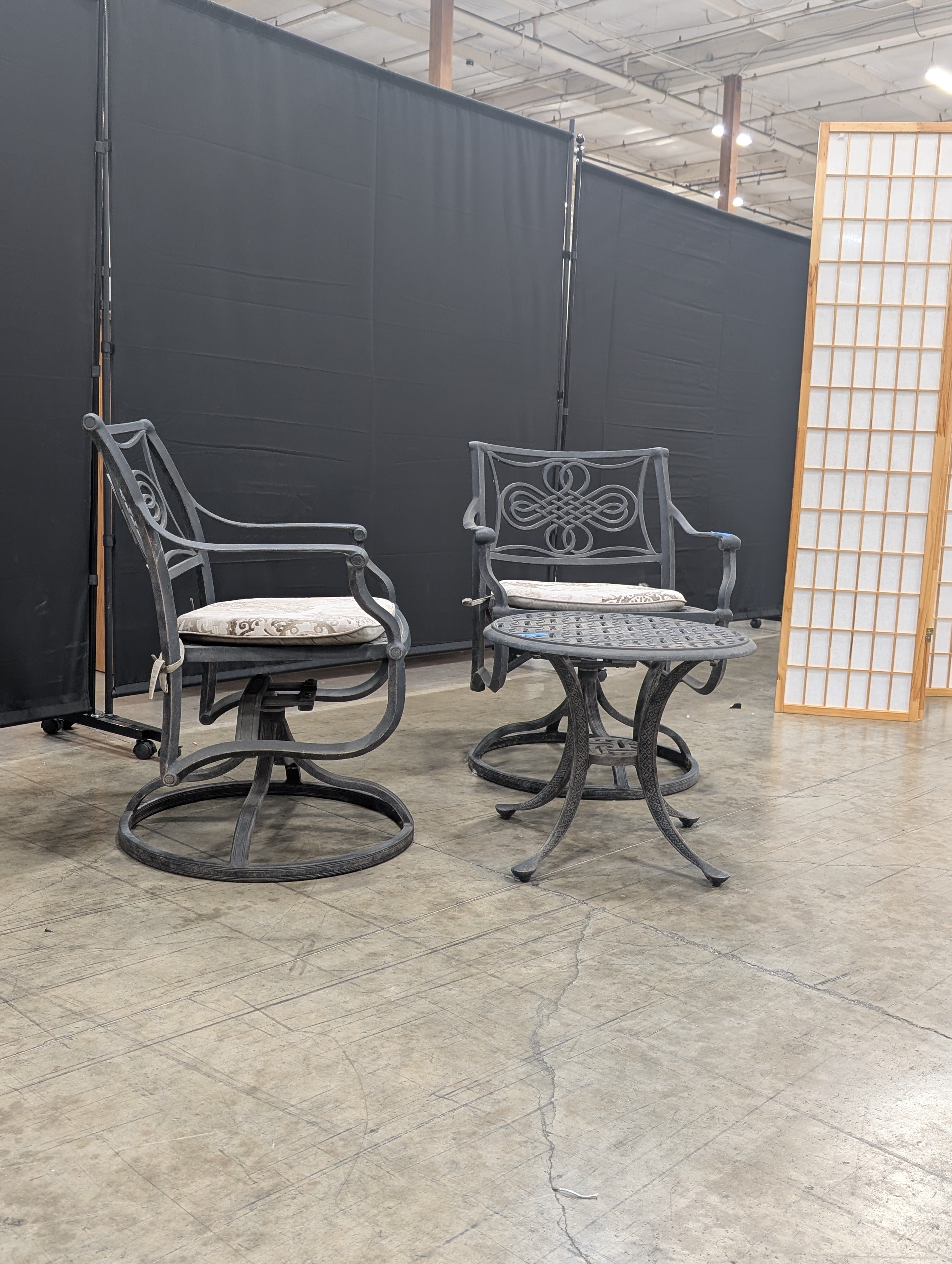 Ornate Cast Metal Outdoor Bistro Set with Swivel Chairs