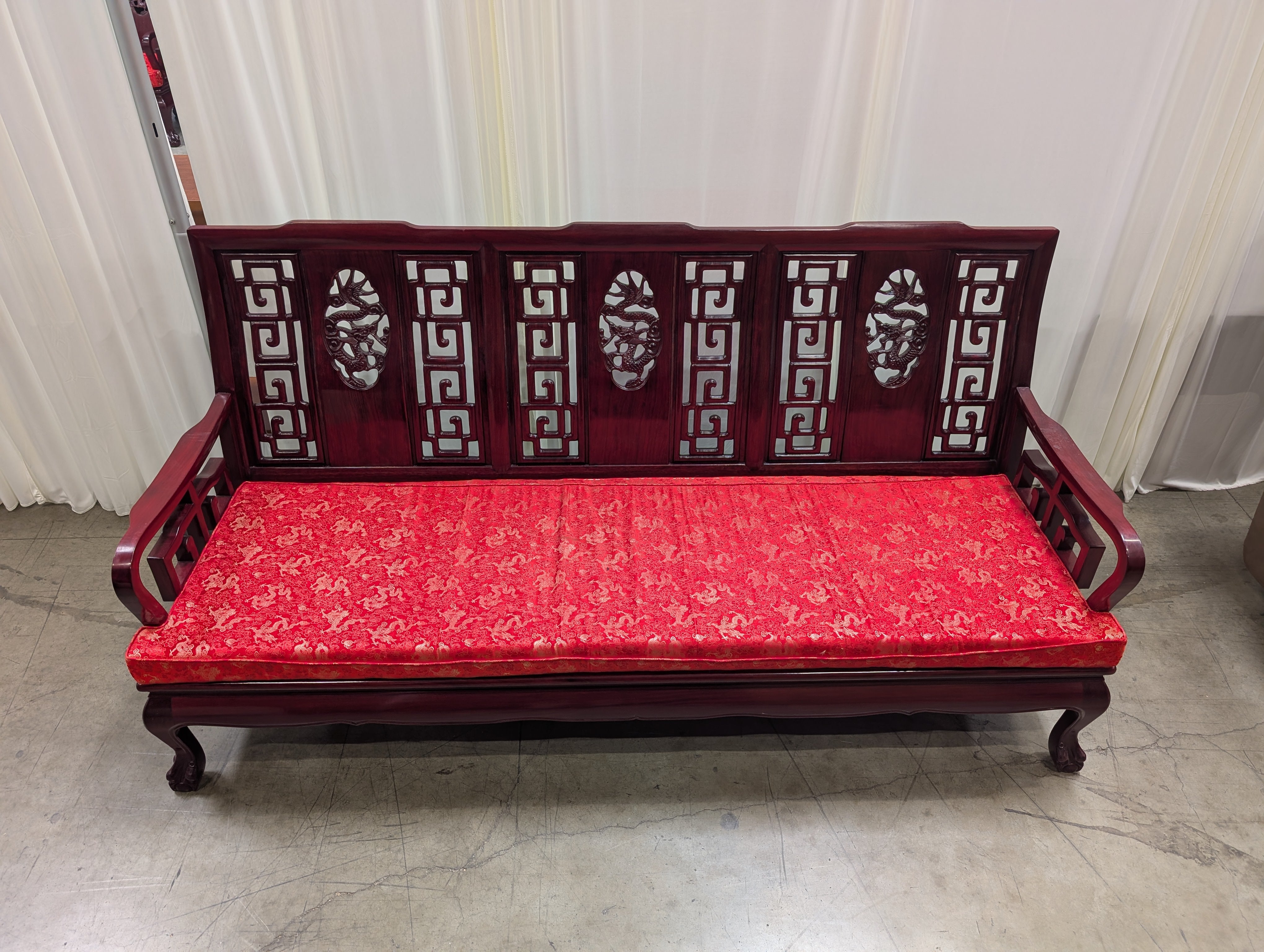 Dark Wood Asian Style Couch with Red Cushion