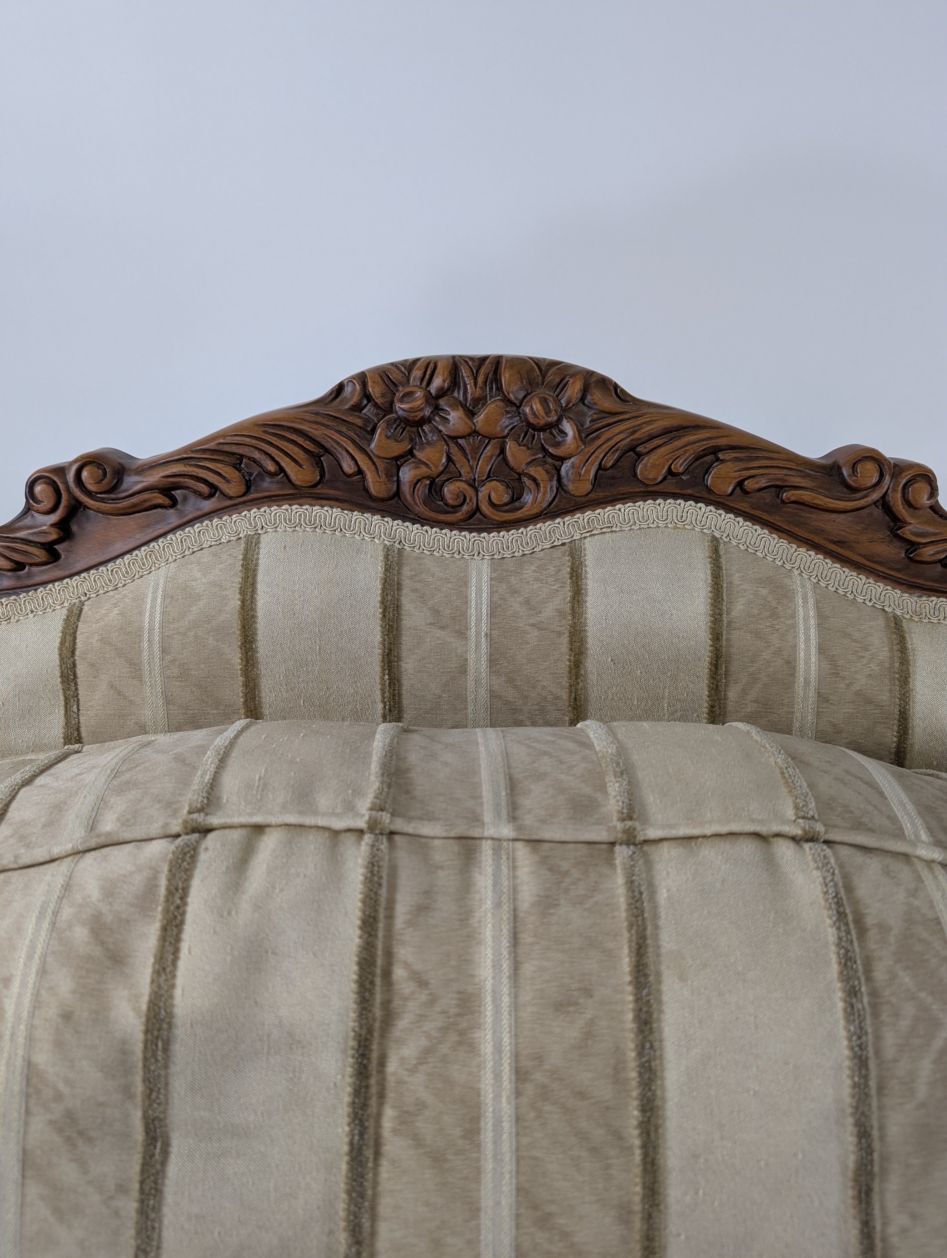 Ornate Carved Wood Armchair with Striped Upholstery
