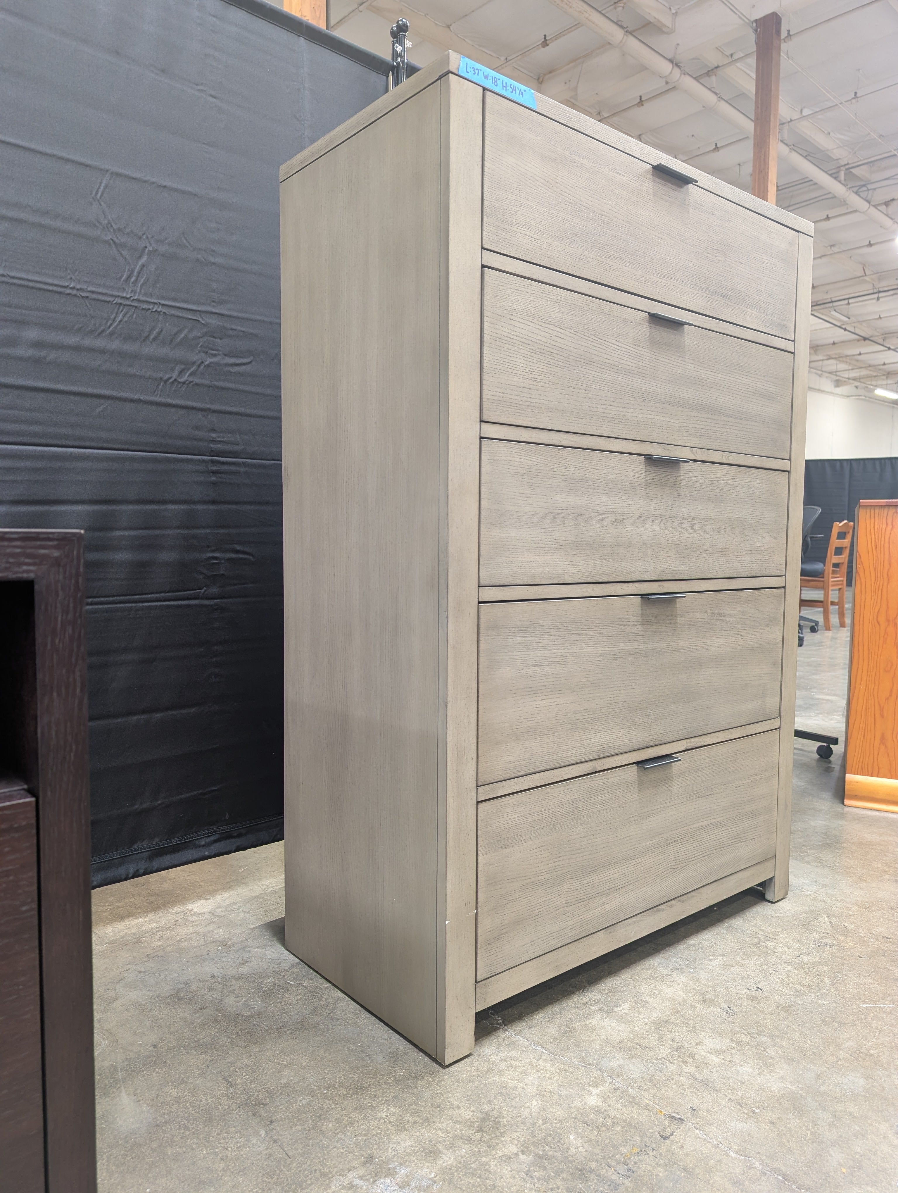 Grey Wood Five-Drawer Dresser with Metal Pulls