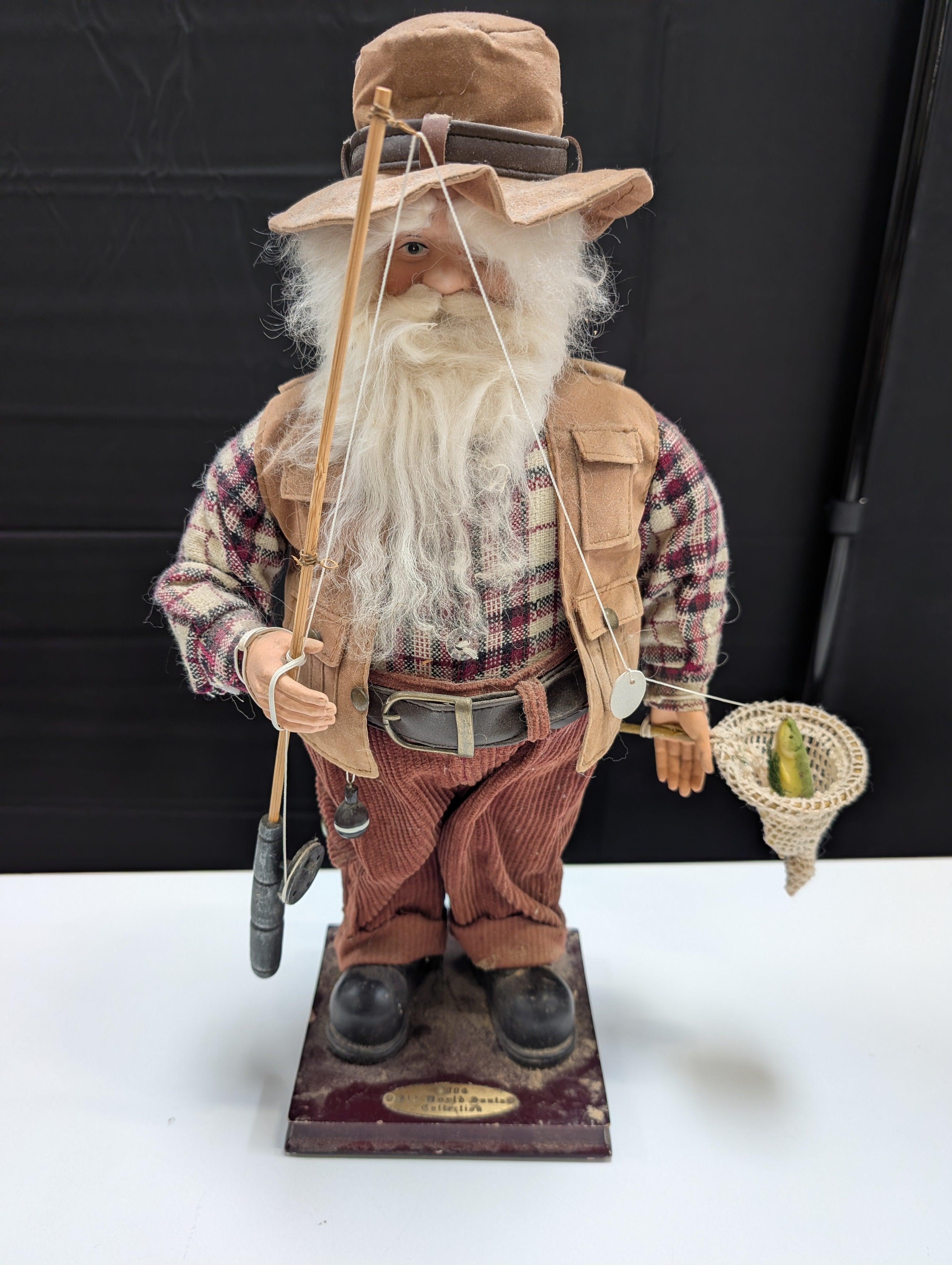 Rustic Fisherman Figurine with Fishing Rod and Hat