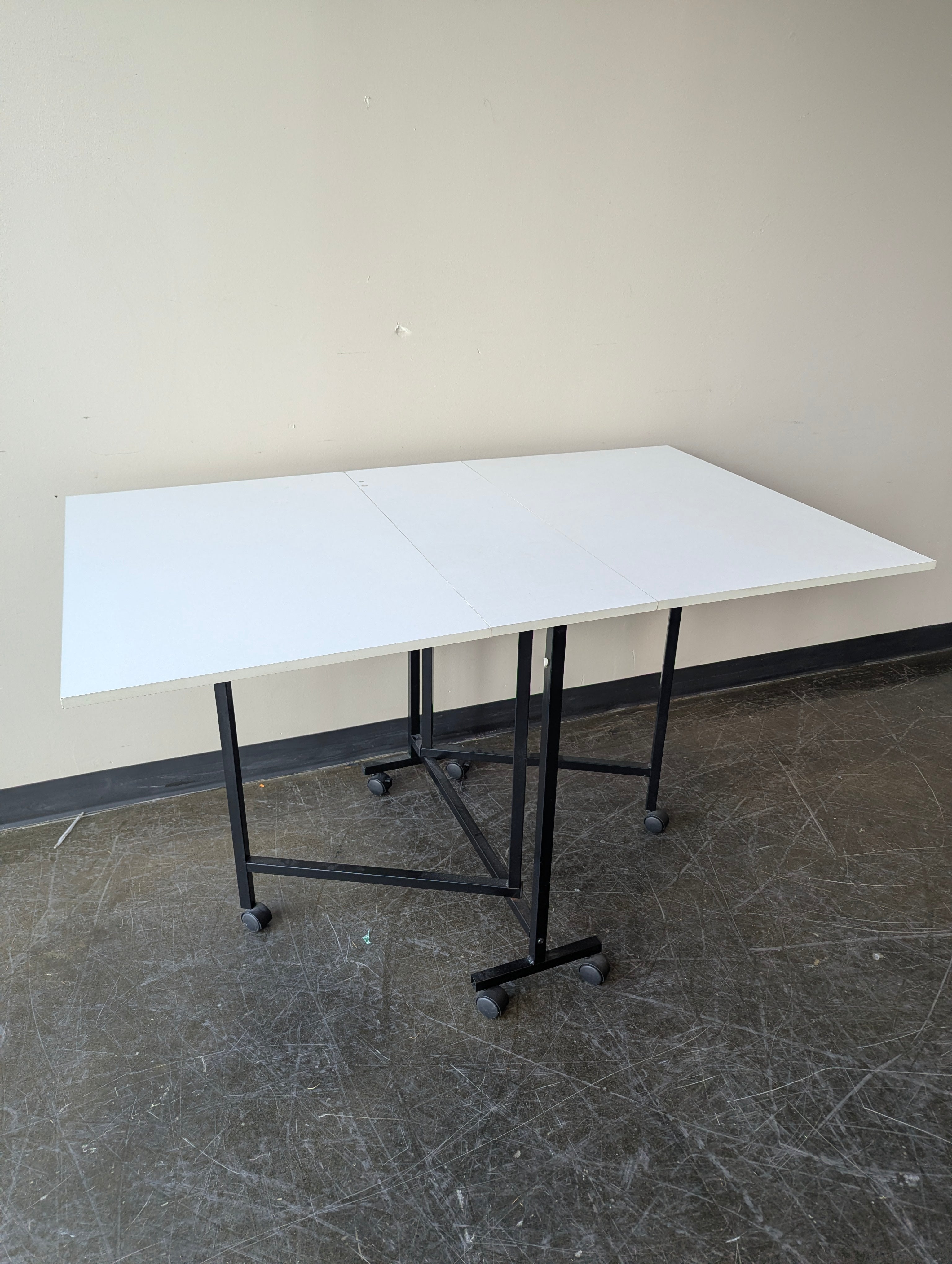 Versatile Folding Drop Leaf Table with Casters - Compact Design