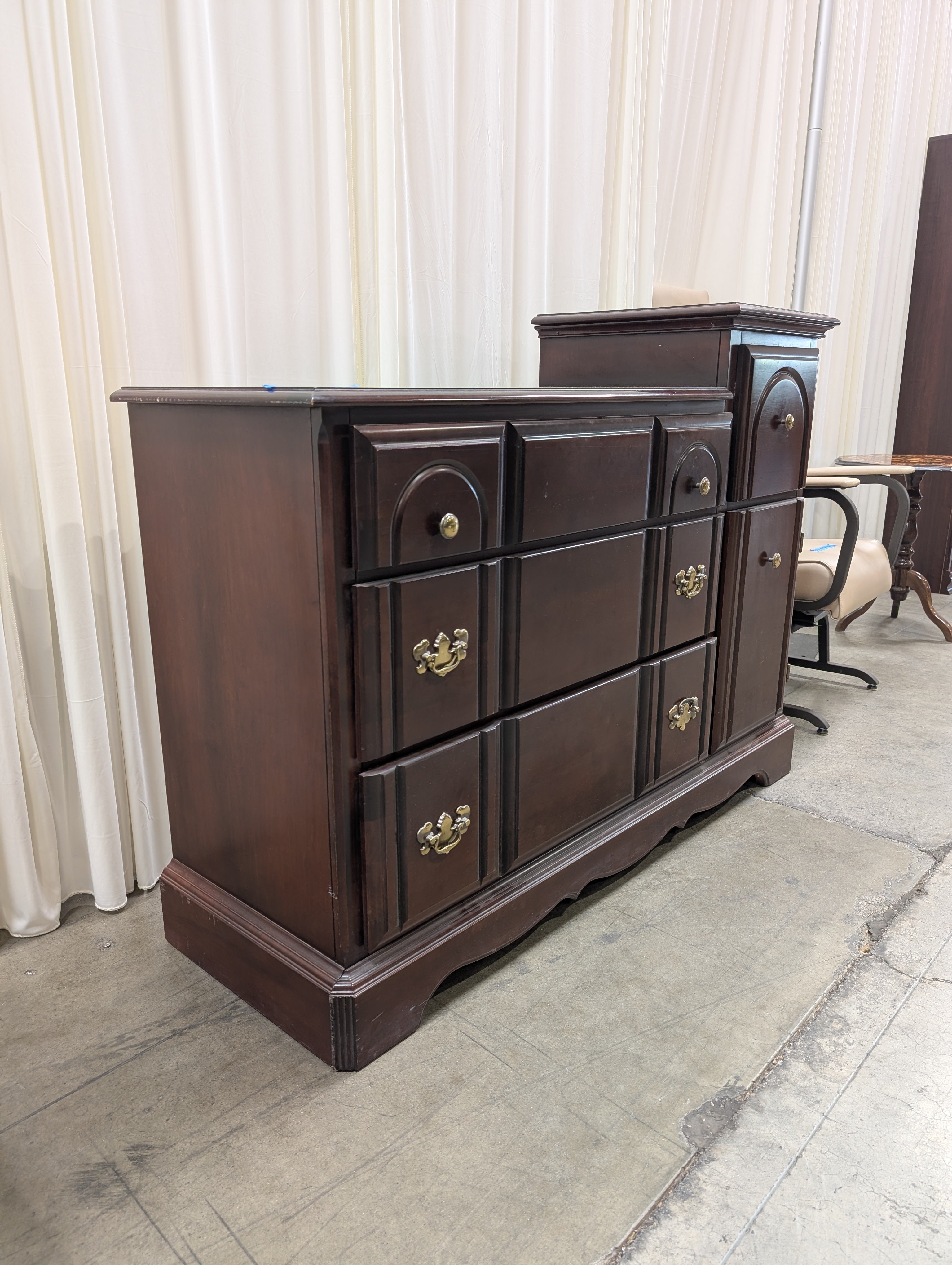 Traditional Dark Wood Dresser with Ornate Hardware