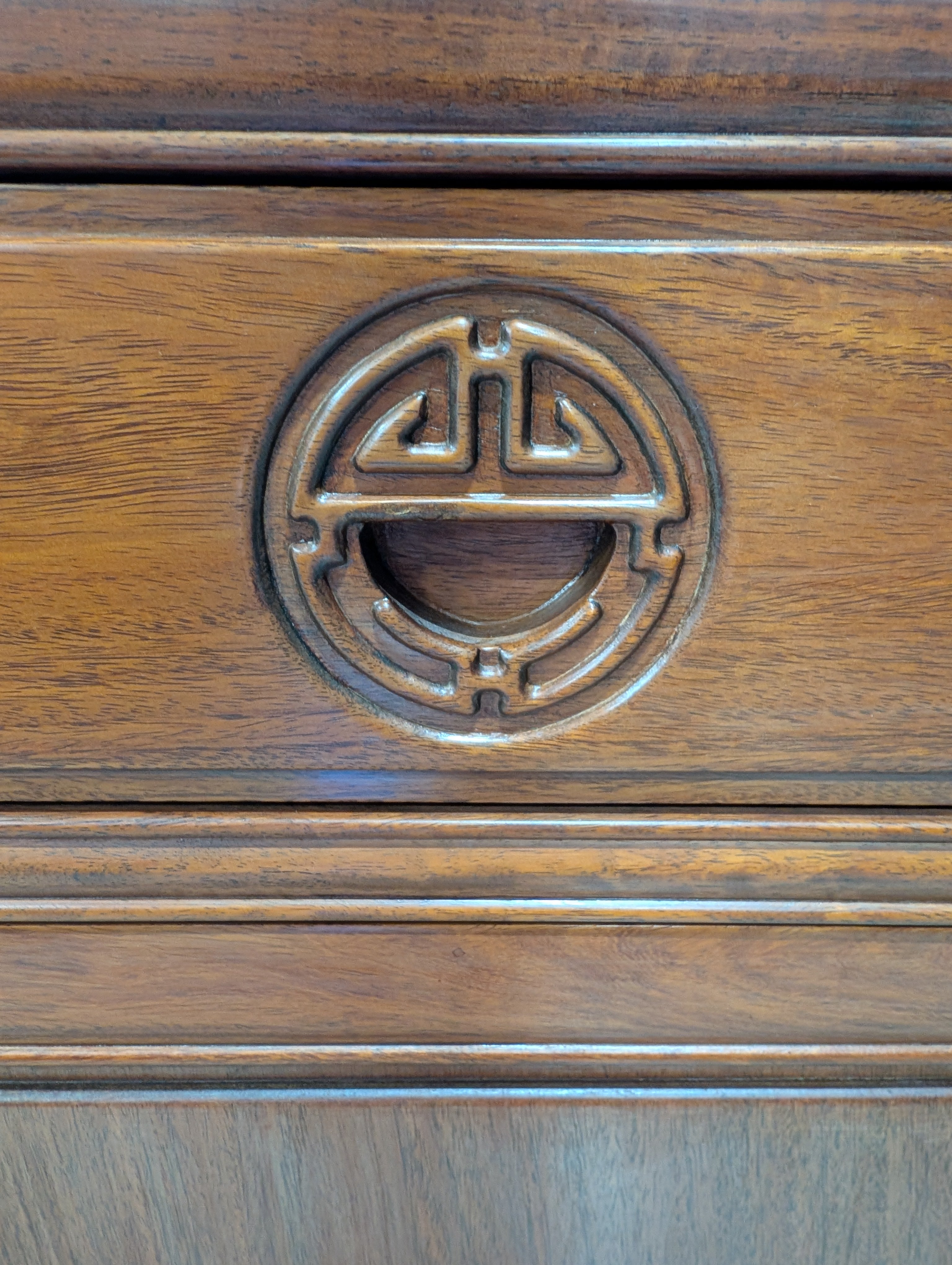 Rich Toned Wooden Sideboard with Carved Accents