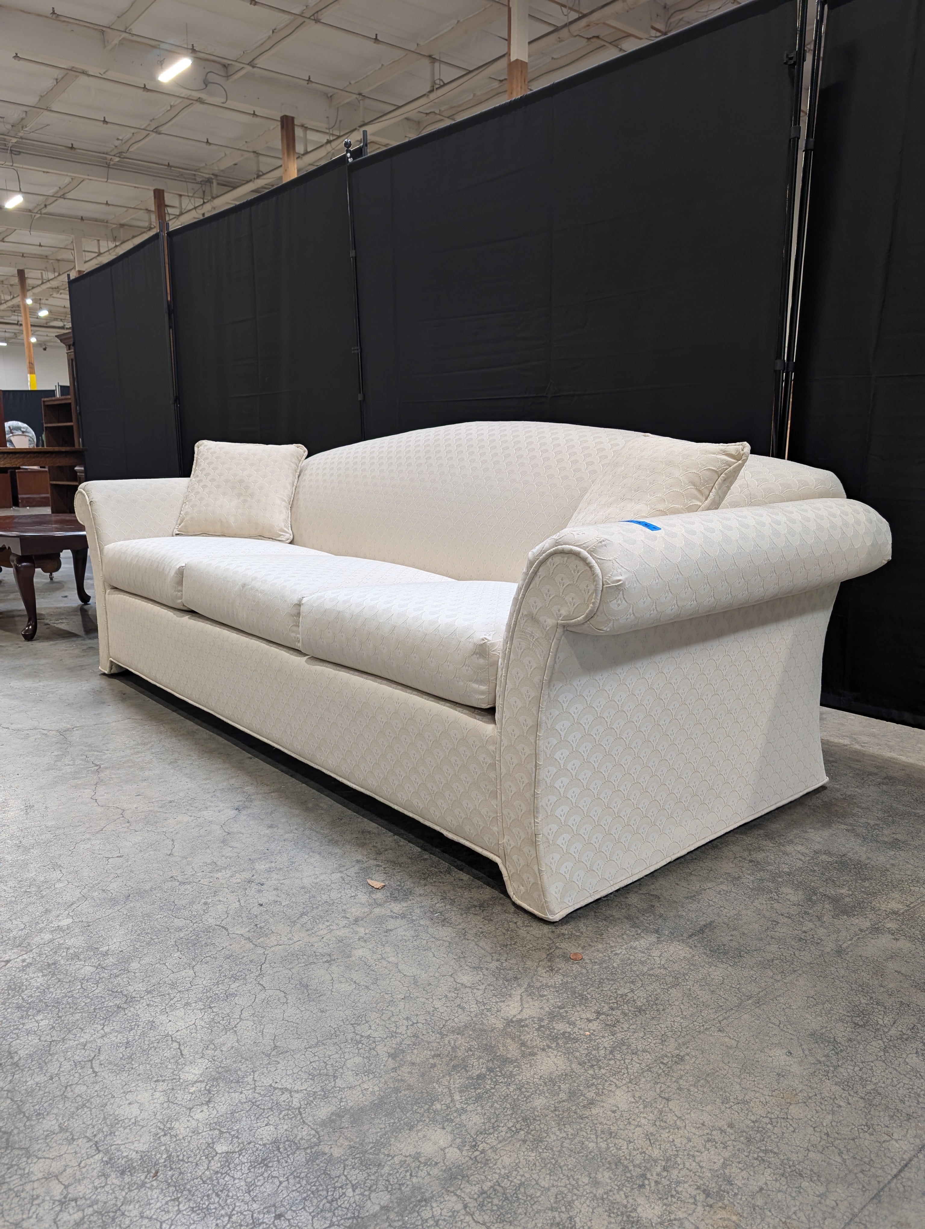 Cream Patterned Upholstered Sofa with Rolled Arms