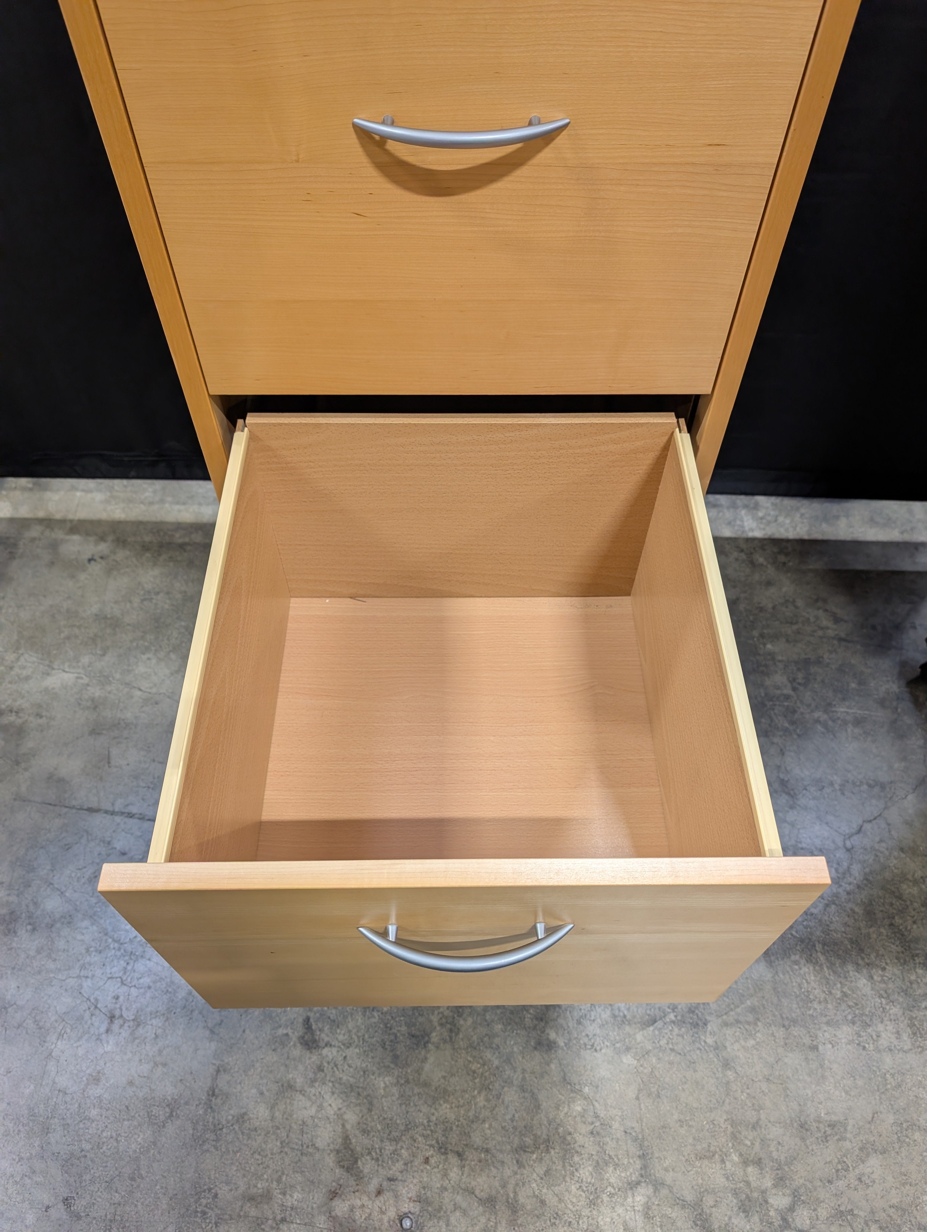 Versatile Blonde Wood Three-Drawer Storage Cabinet