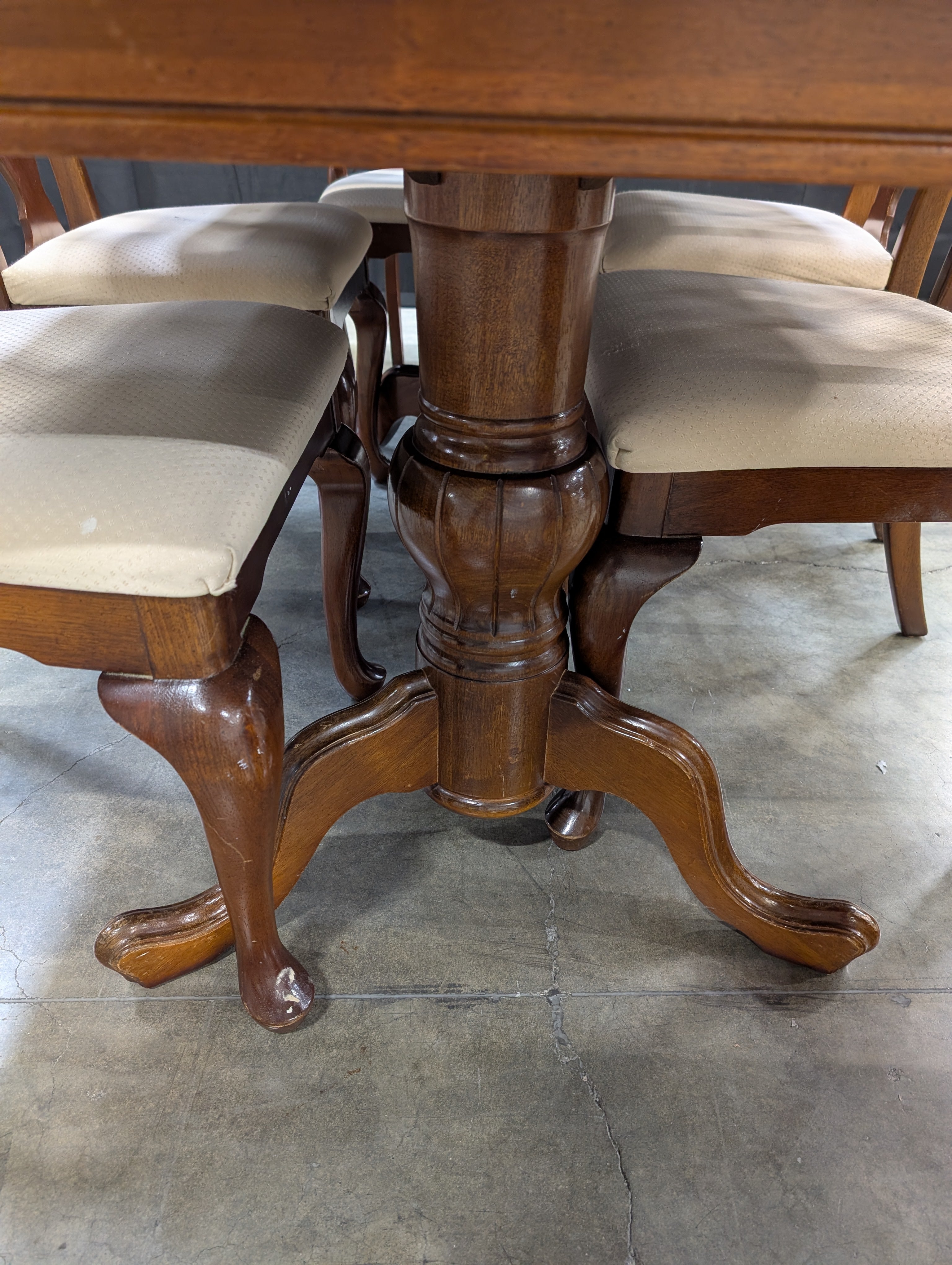 Traditional Dark Wood Dining Table with Six Shaped-Back Chairs