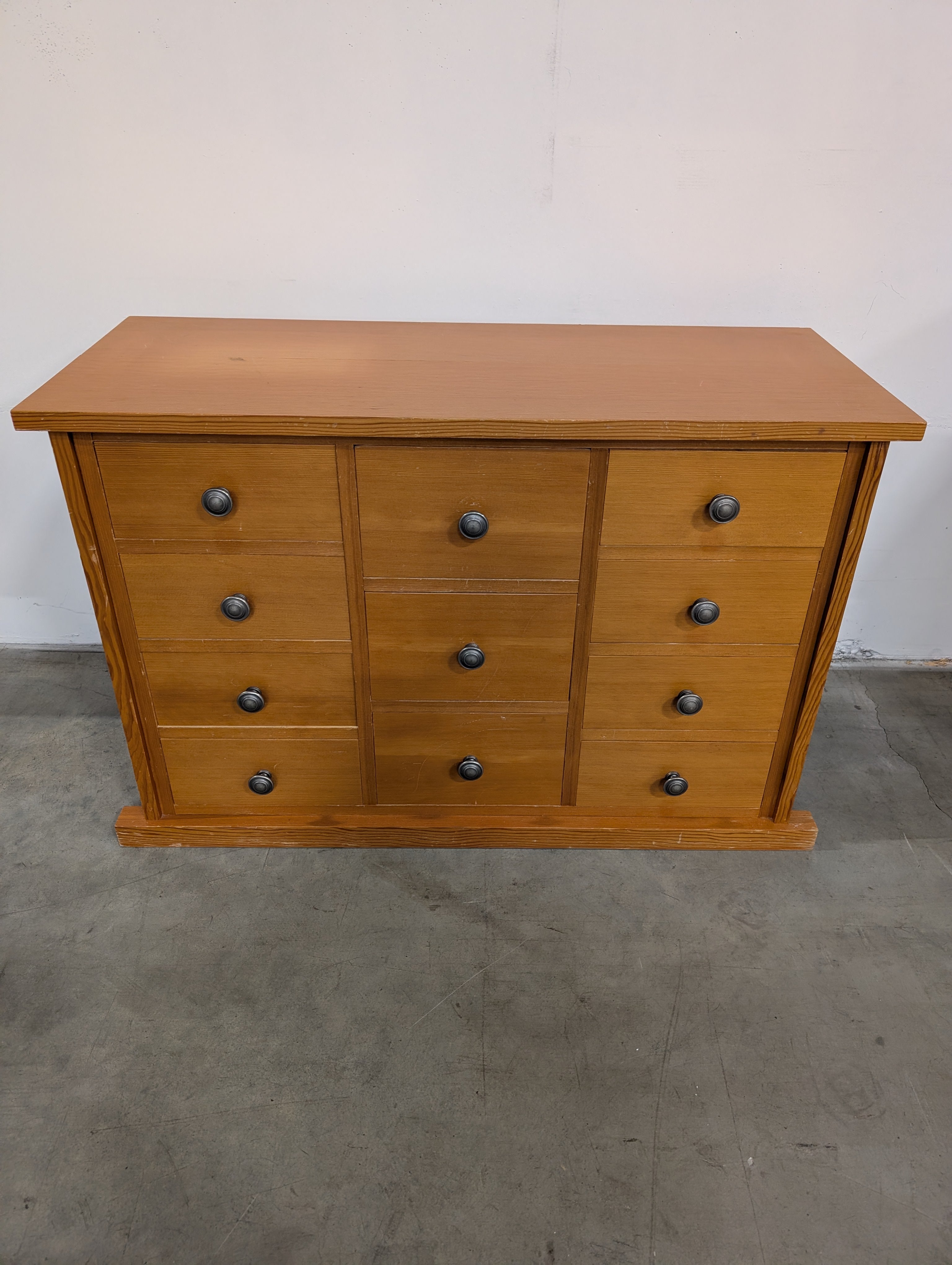 Warm Honey Wood Nine-Drawer Storage Chest