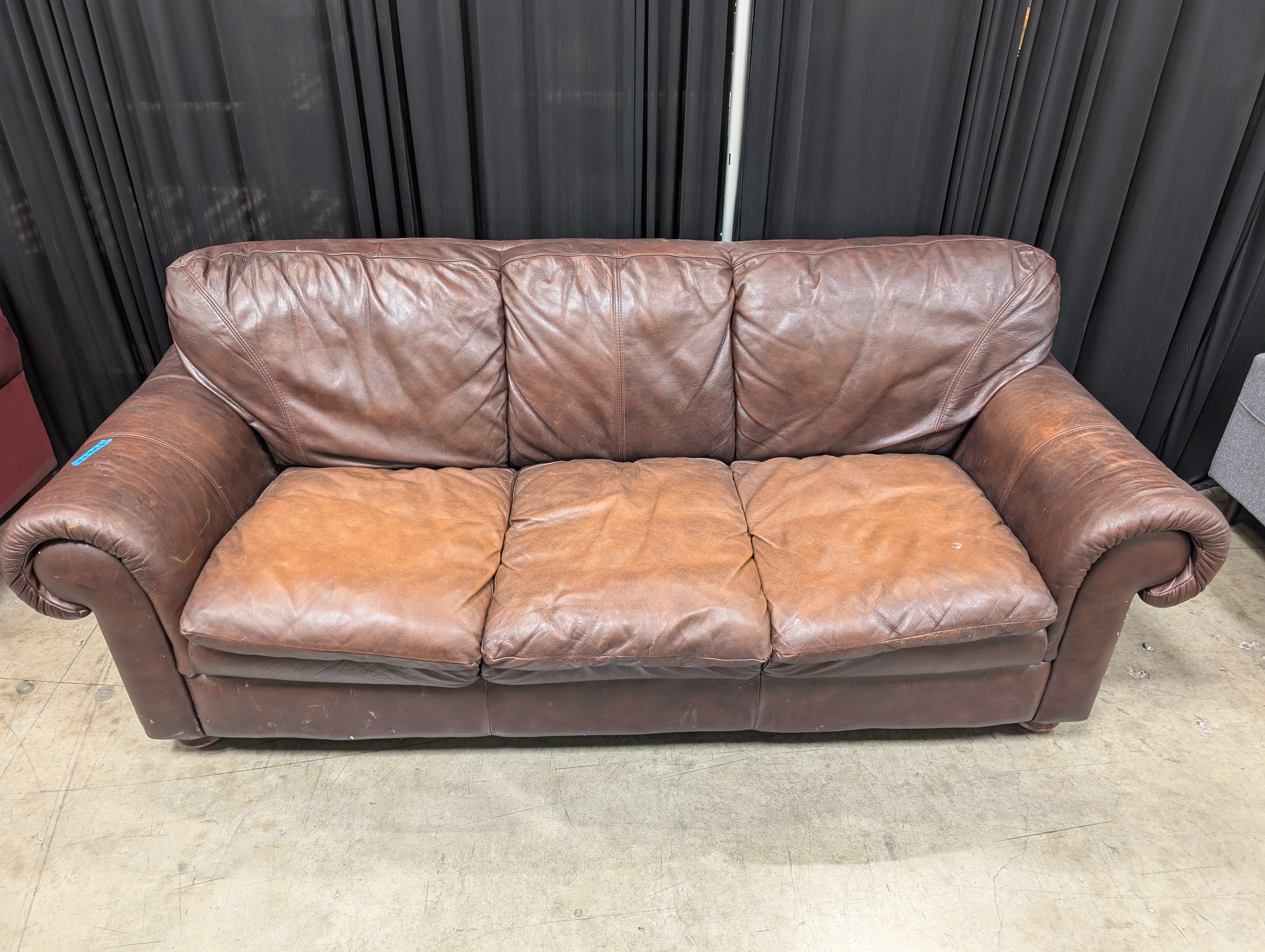 Brown Leather Three-Cushion Couch
