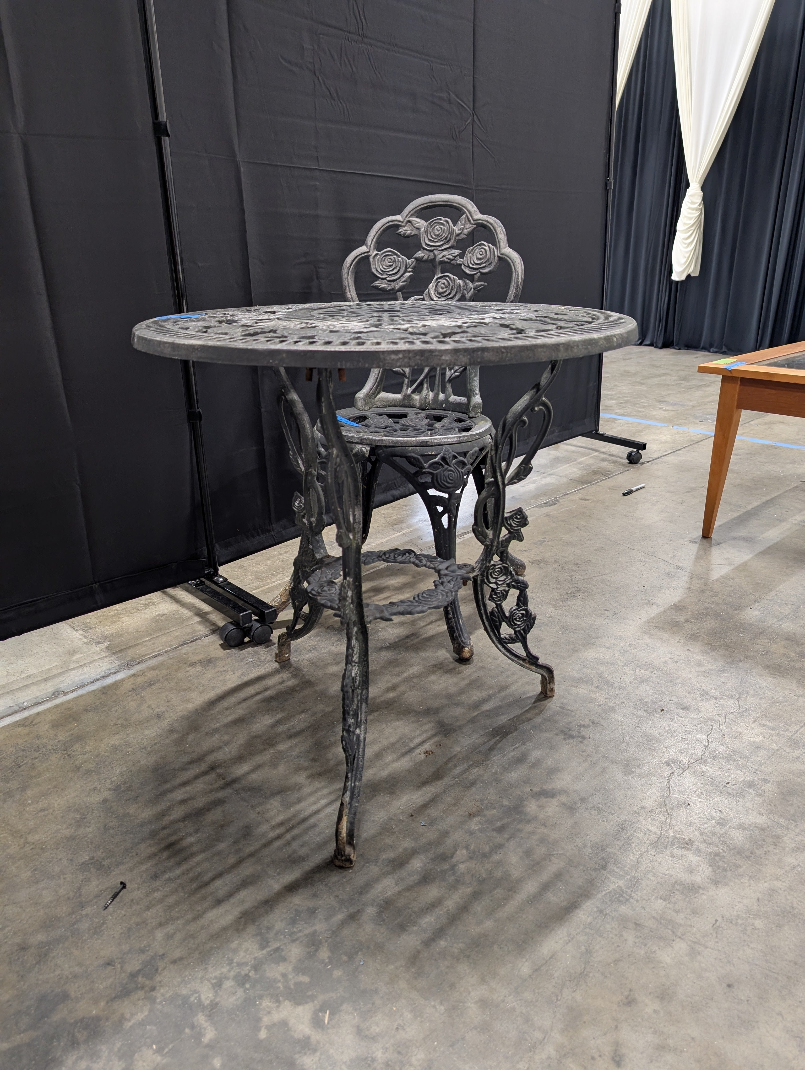Round Black Cast Iron End Table with Floral Pattern