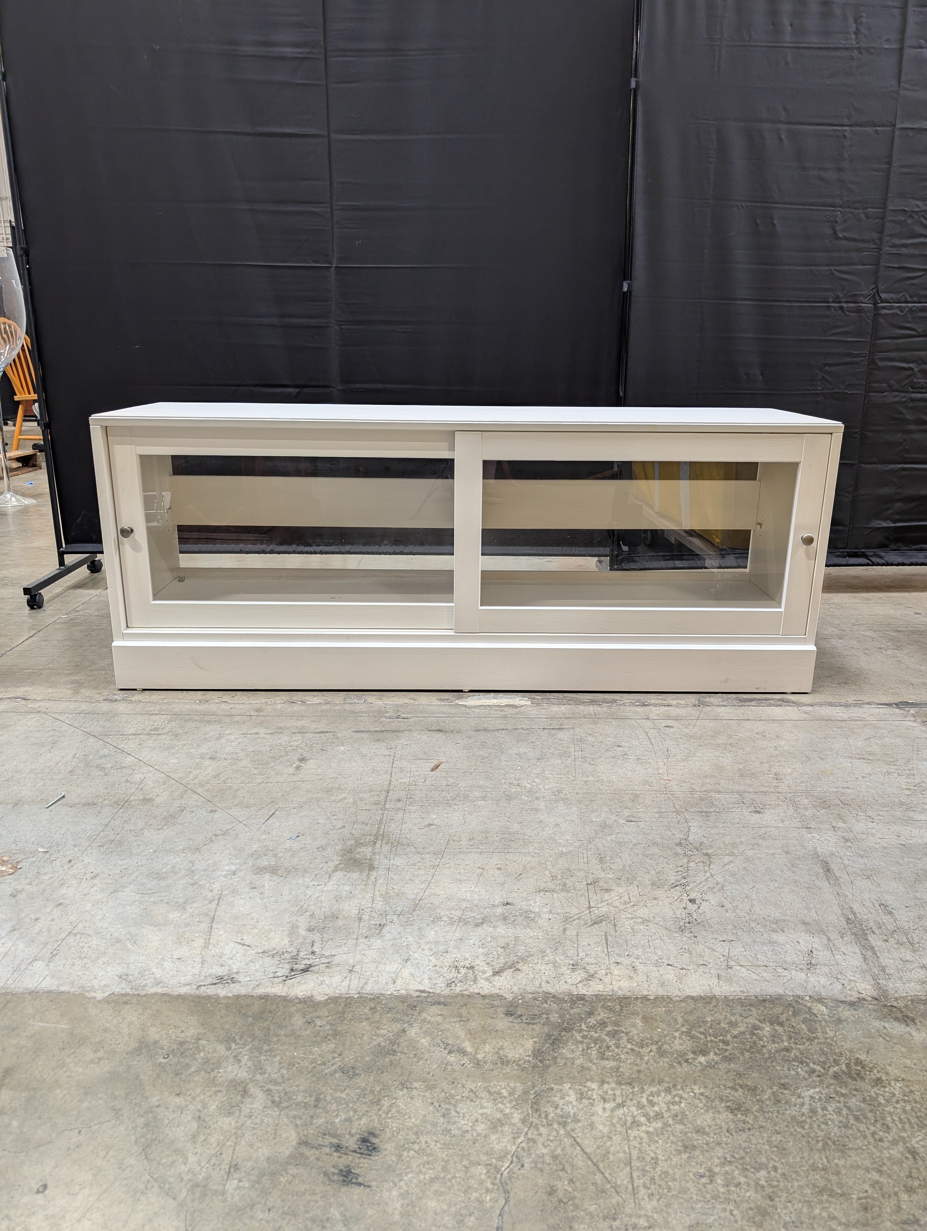White Media Console with Sliding Glass Door