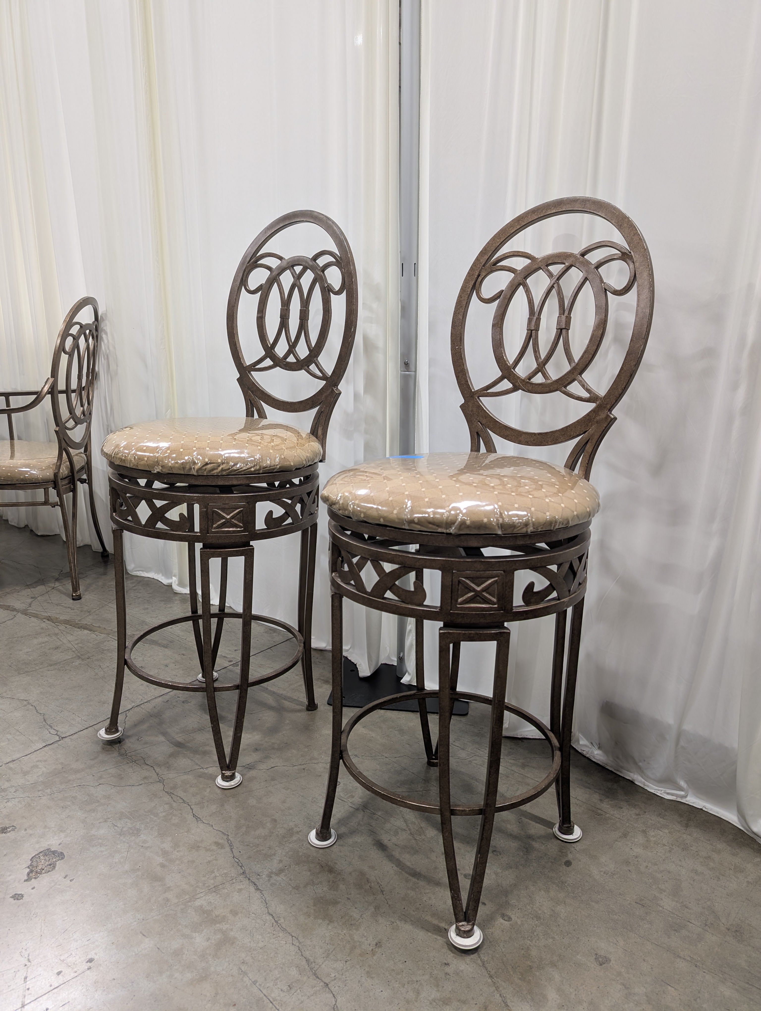 Pair of Ornate Dark Bronze Metal Bar Stools with Upholstered Seats