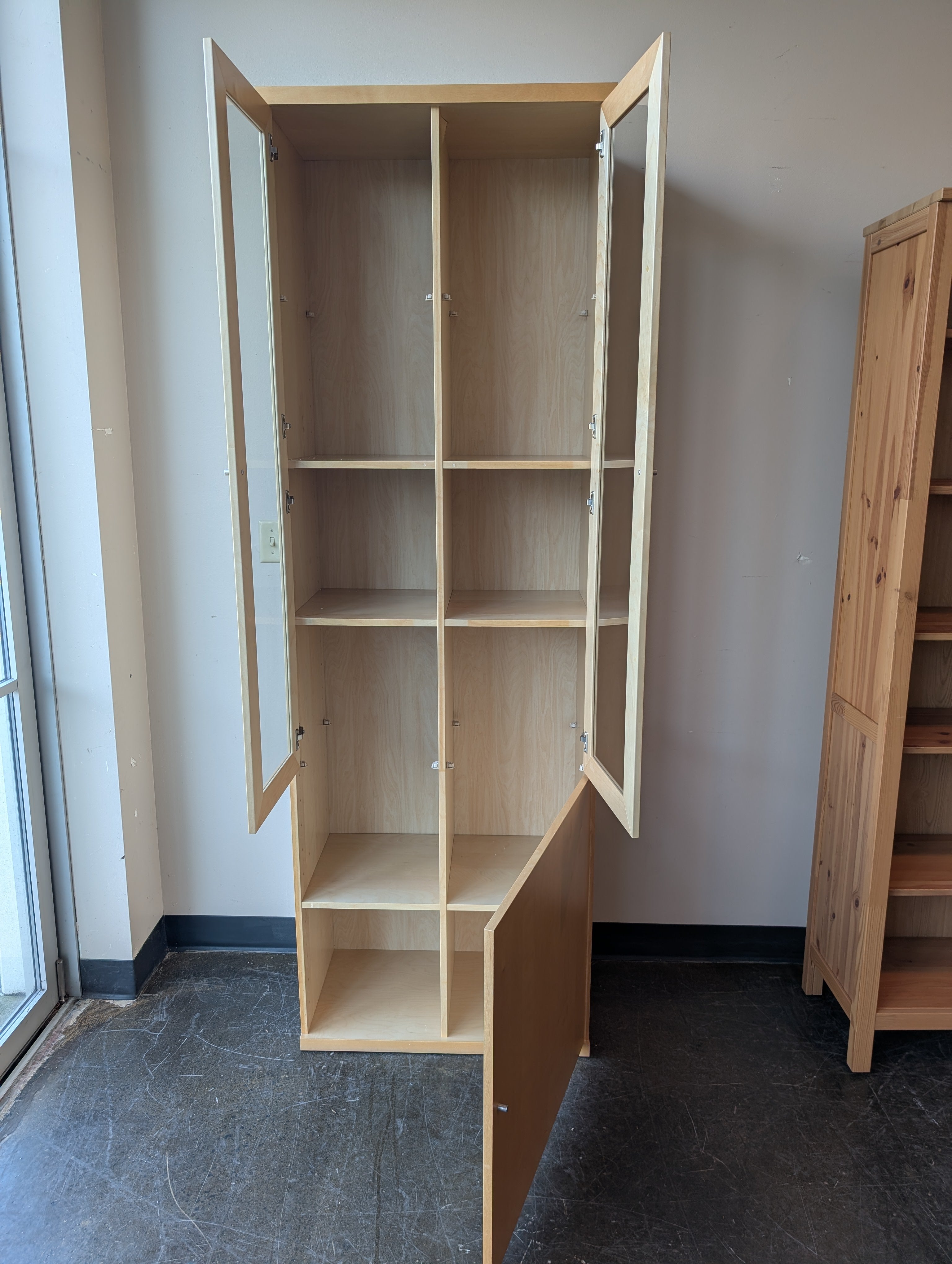 Versatile Light Wood Display and Storage Cabinet