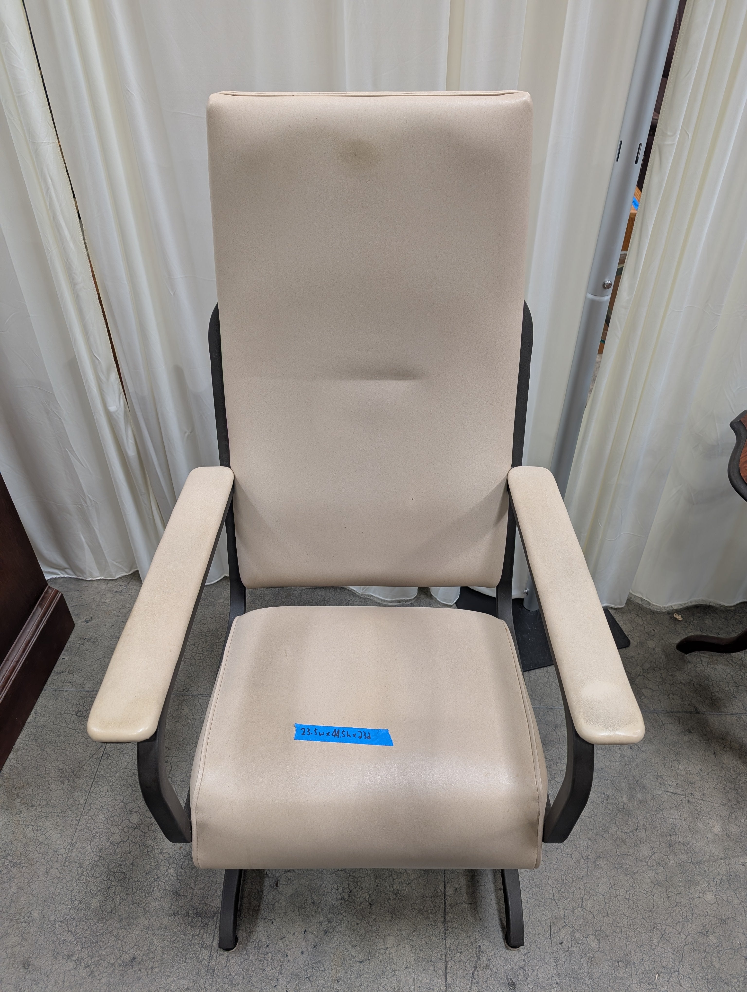 Cream Upholstered High-Back Chair with Metal Frame