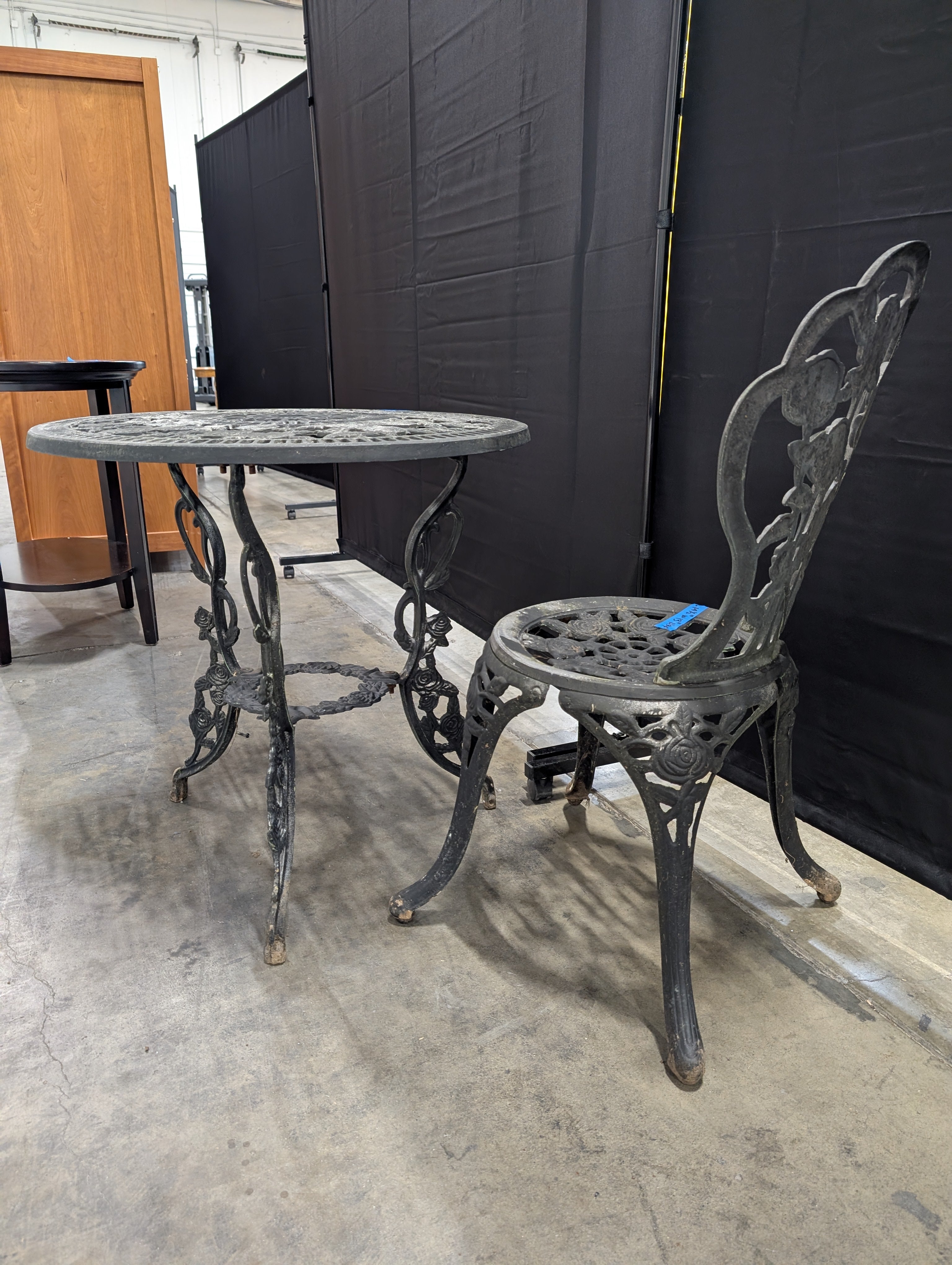 Round Black Cast Iron End Table with Floral Pattern