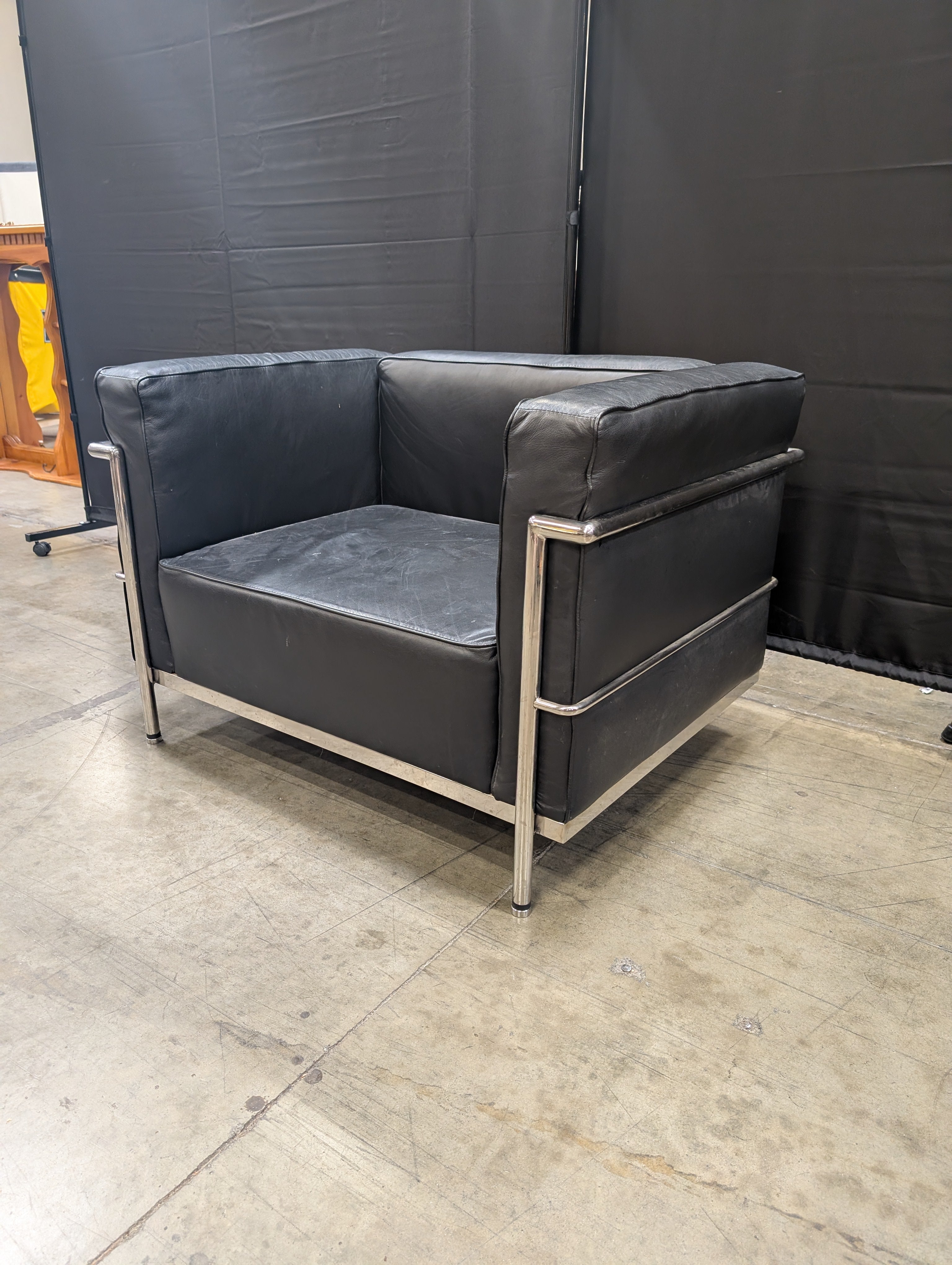 Modern Black Armchair with Polished Metal Frame