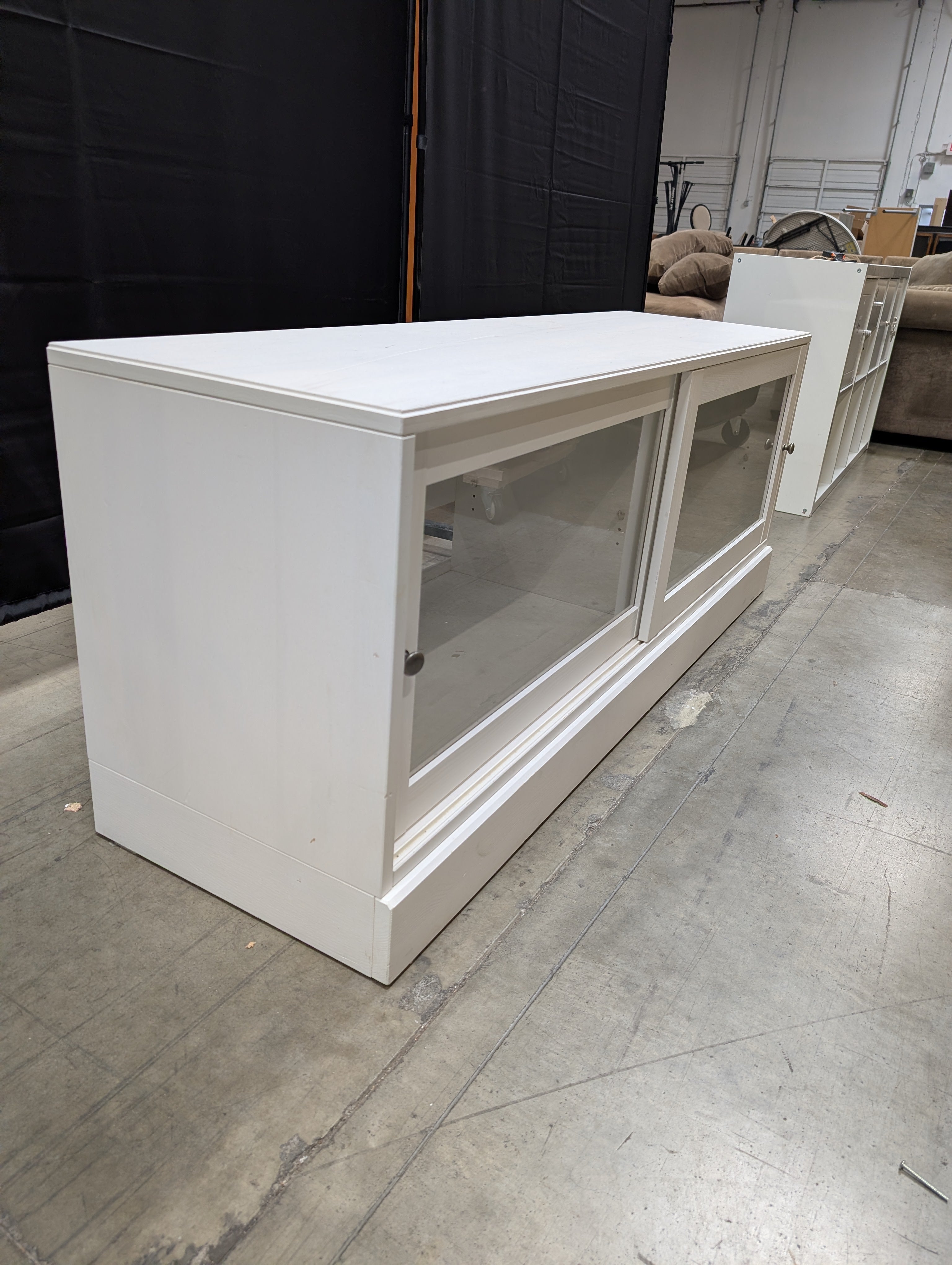 White Media Console with Sliding Glass Door