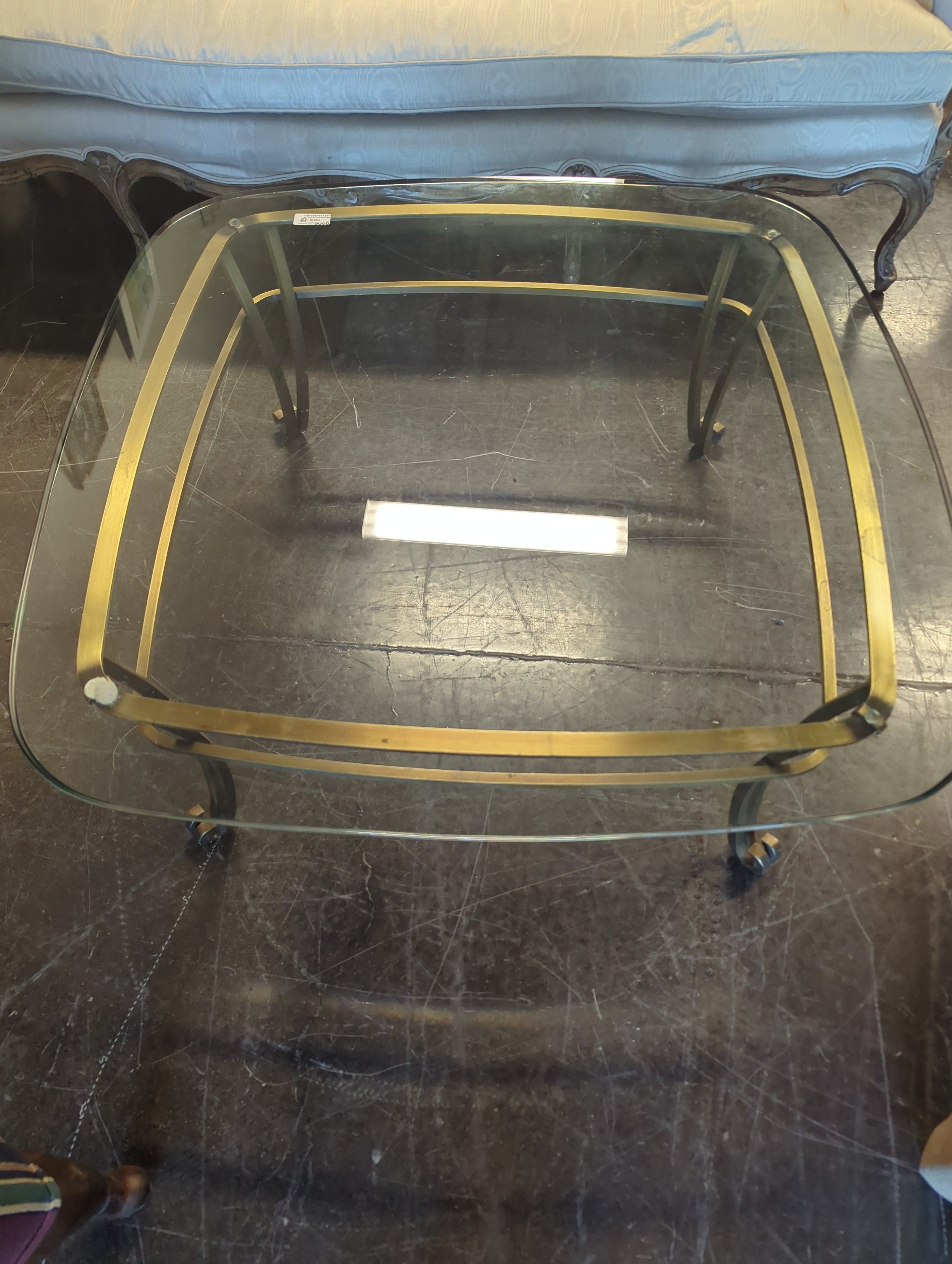 Sophisticated Glass Top Coffee Table with Brass Frame