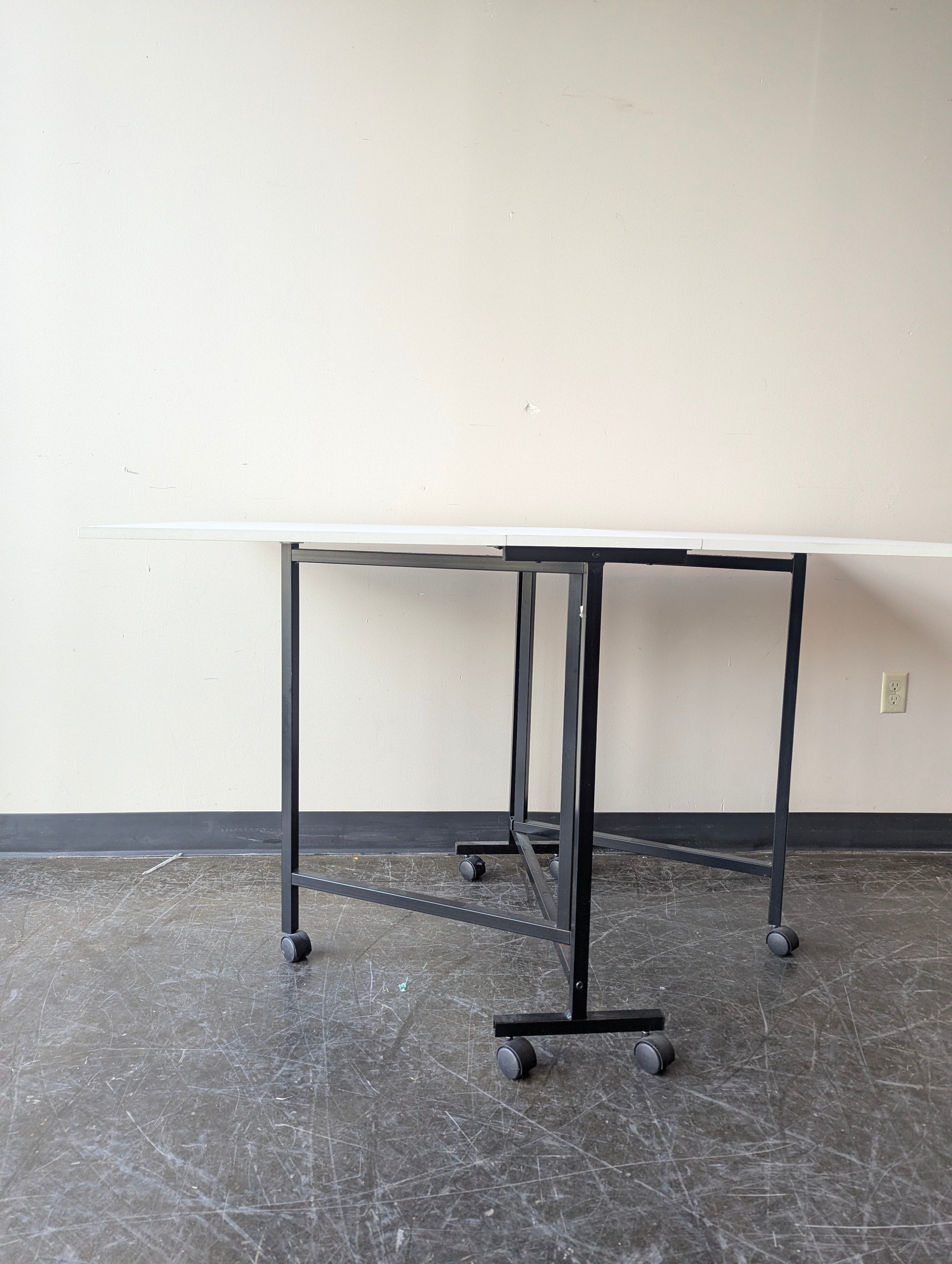 Versatile Folding Drop Leaf Table with Casters - Compact Design