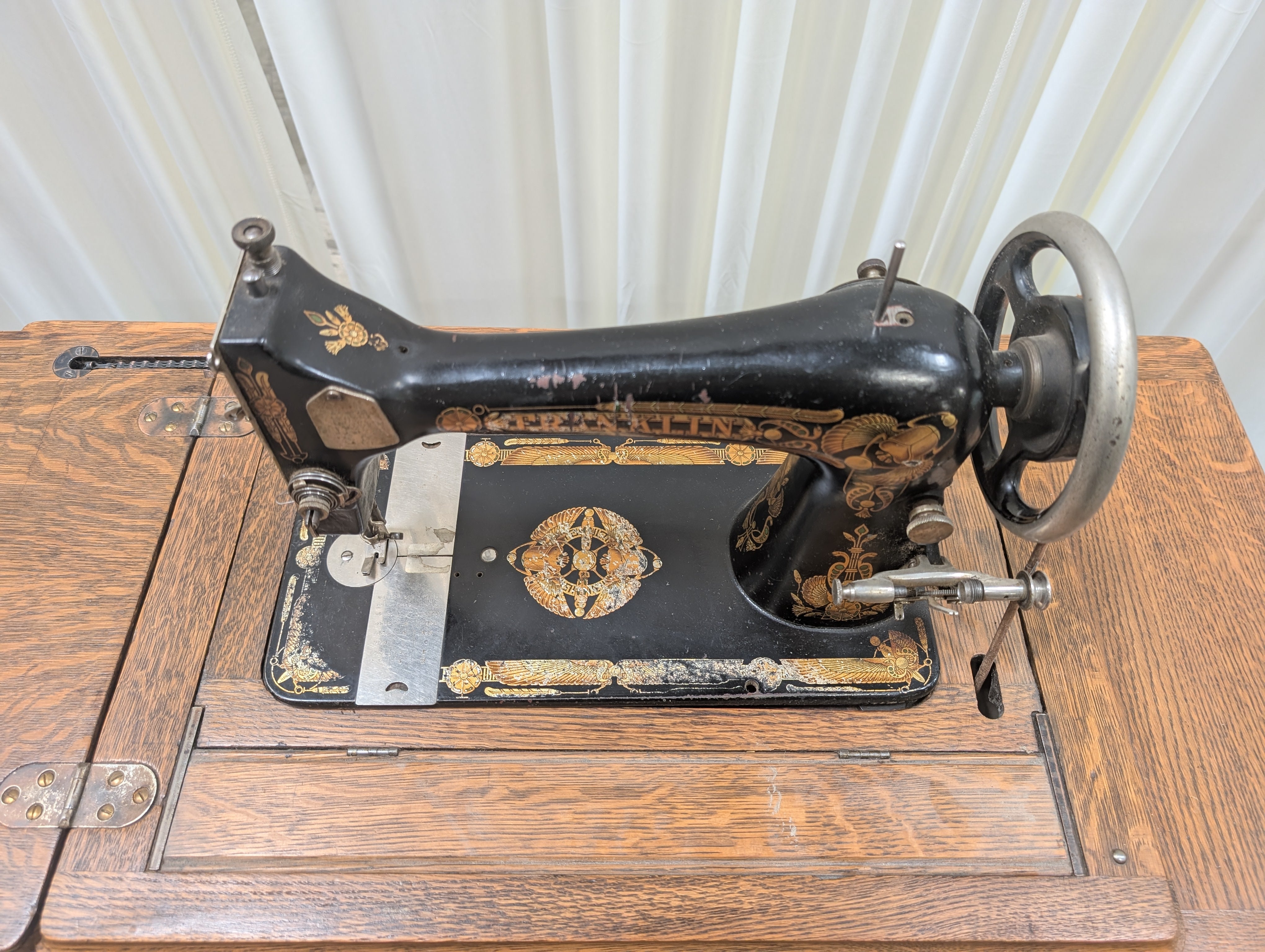 Oak Wood Antique Sewing Machine Cabinet with Ornate Details