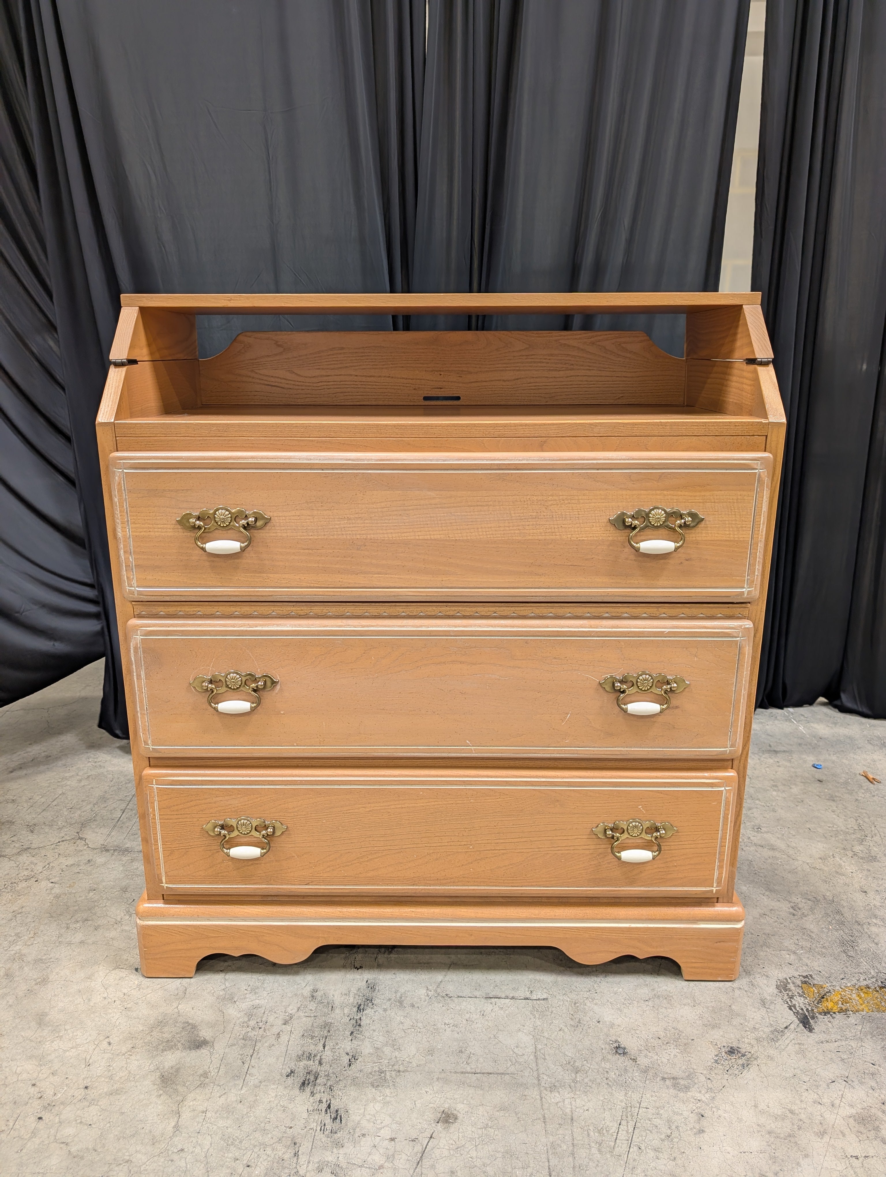 Light Brown Wood Dresser with Ornate Hardware