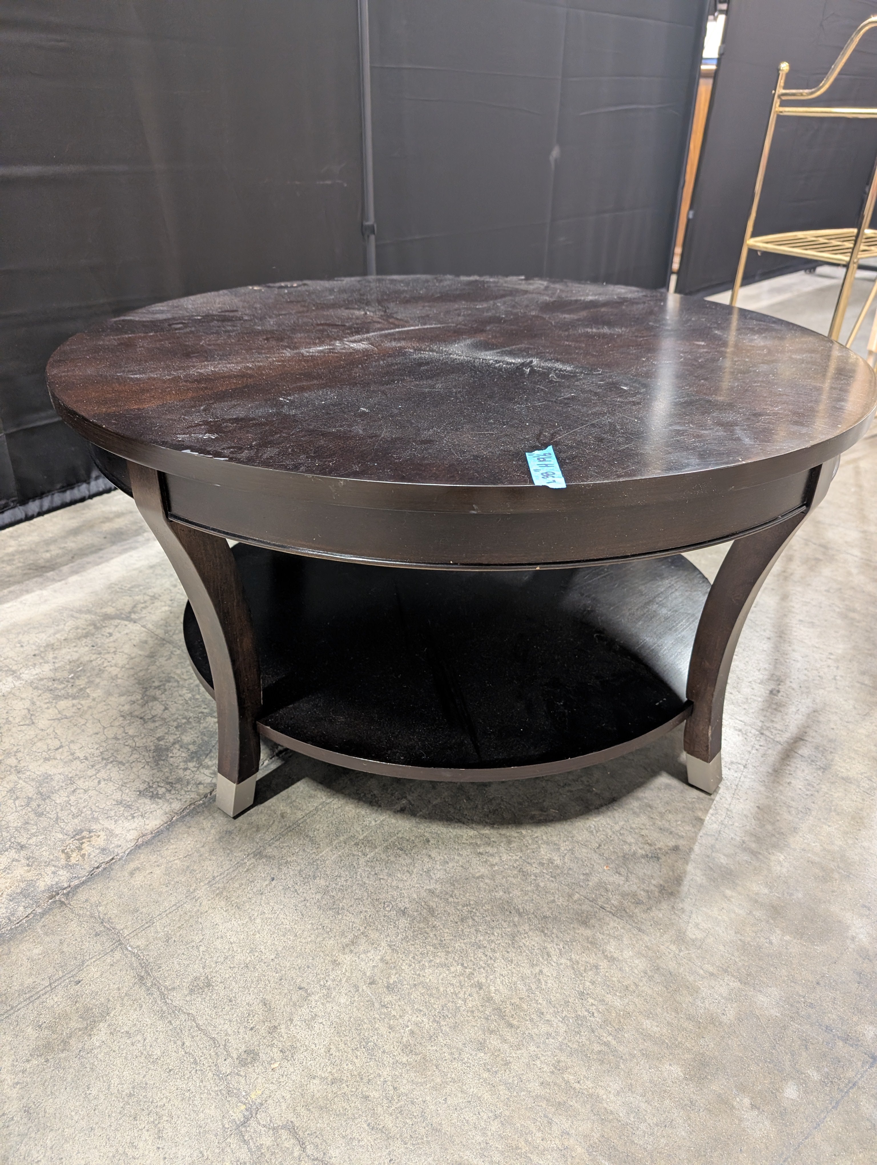 Contemporary Dark Wood Round Coffee Table with Lower Shelf