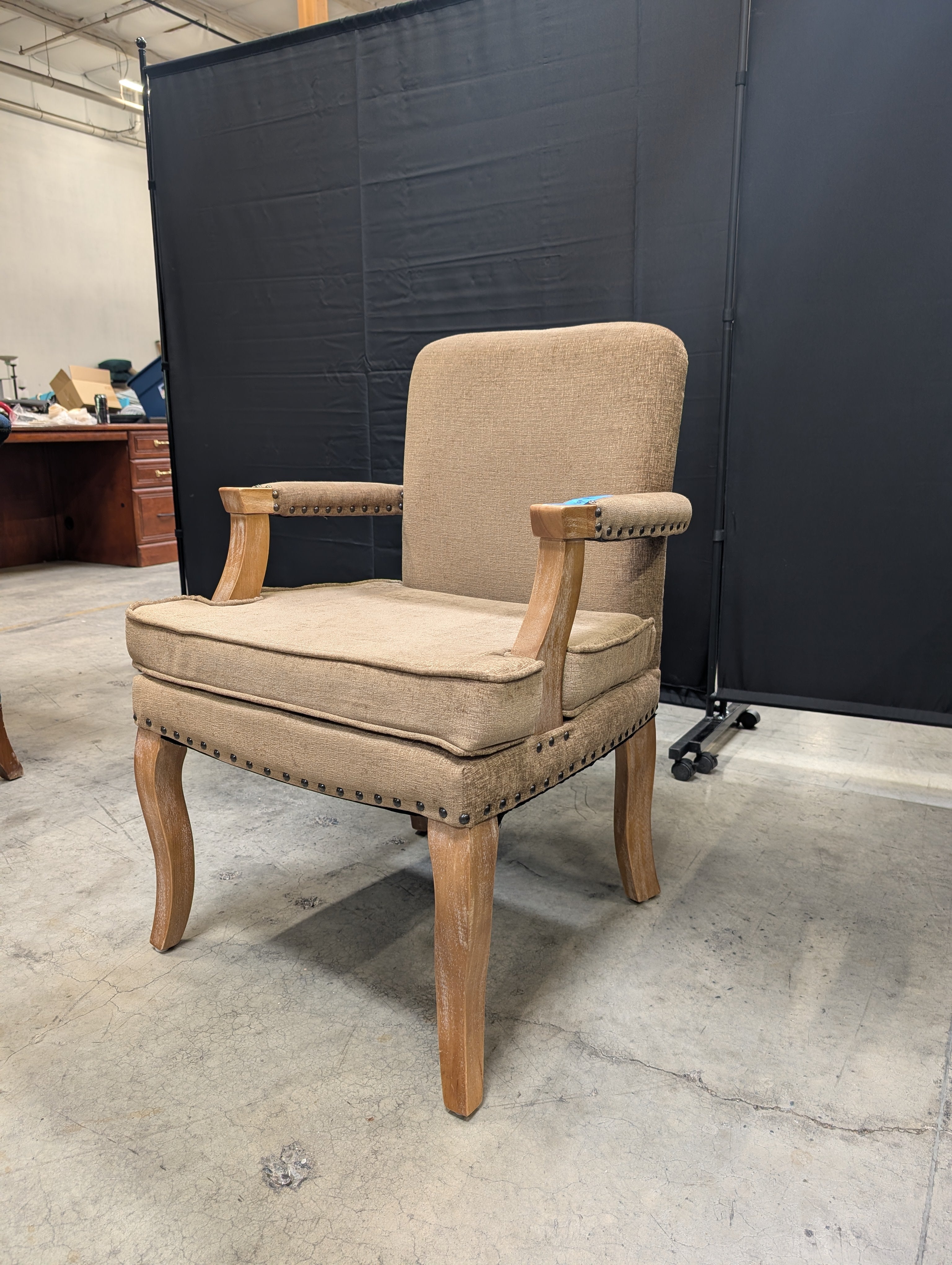 Traditional Upholstered Armchair with Carved Wood Accents