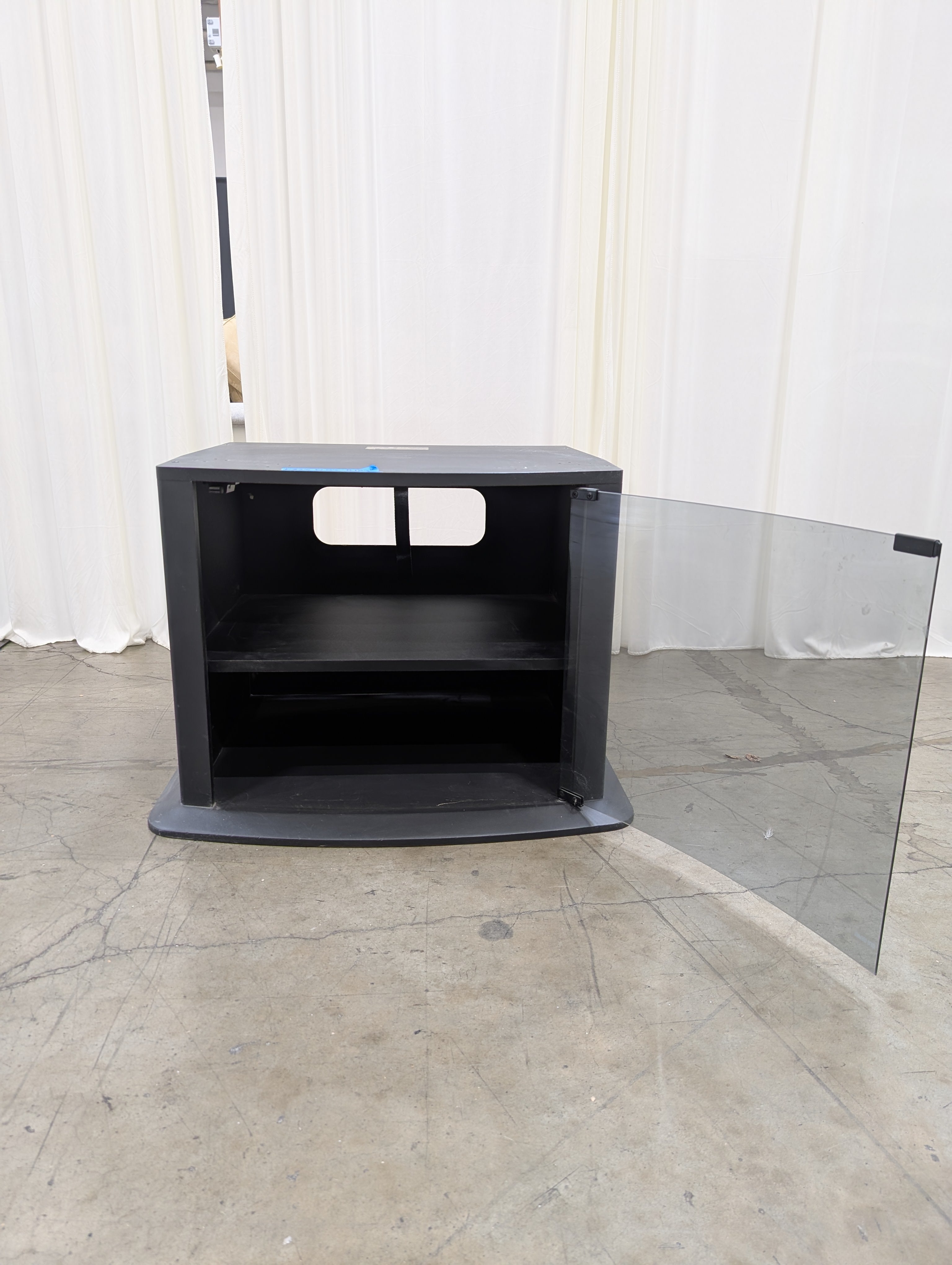 Curved Black Glass TV Stand with Tinted Door