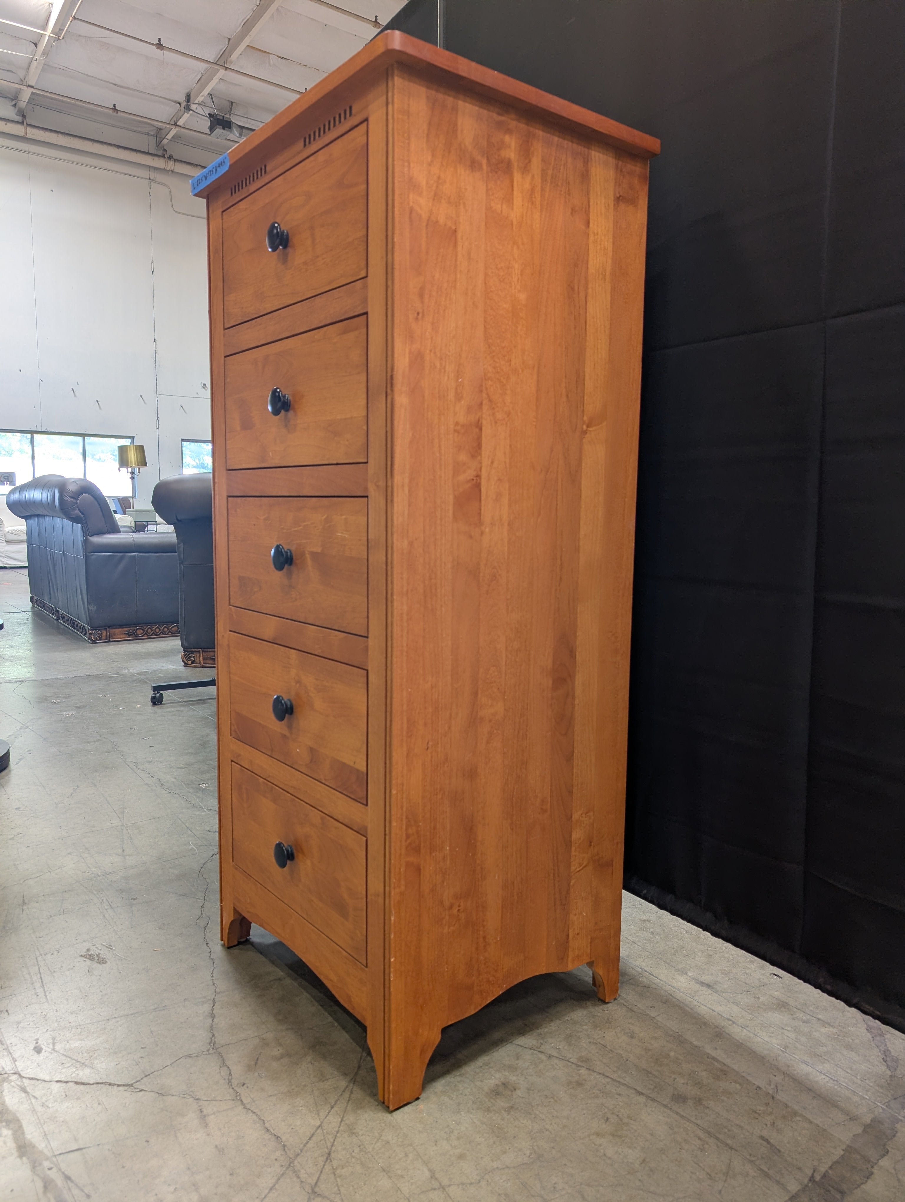 Five-Drawer Wood Dresser with Black Knobs