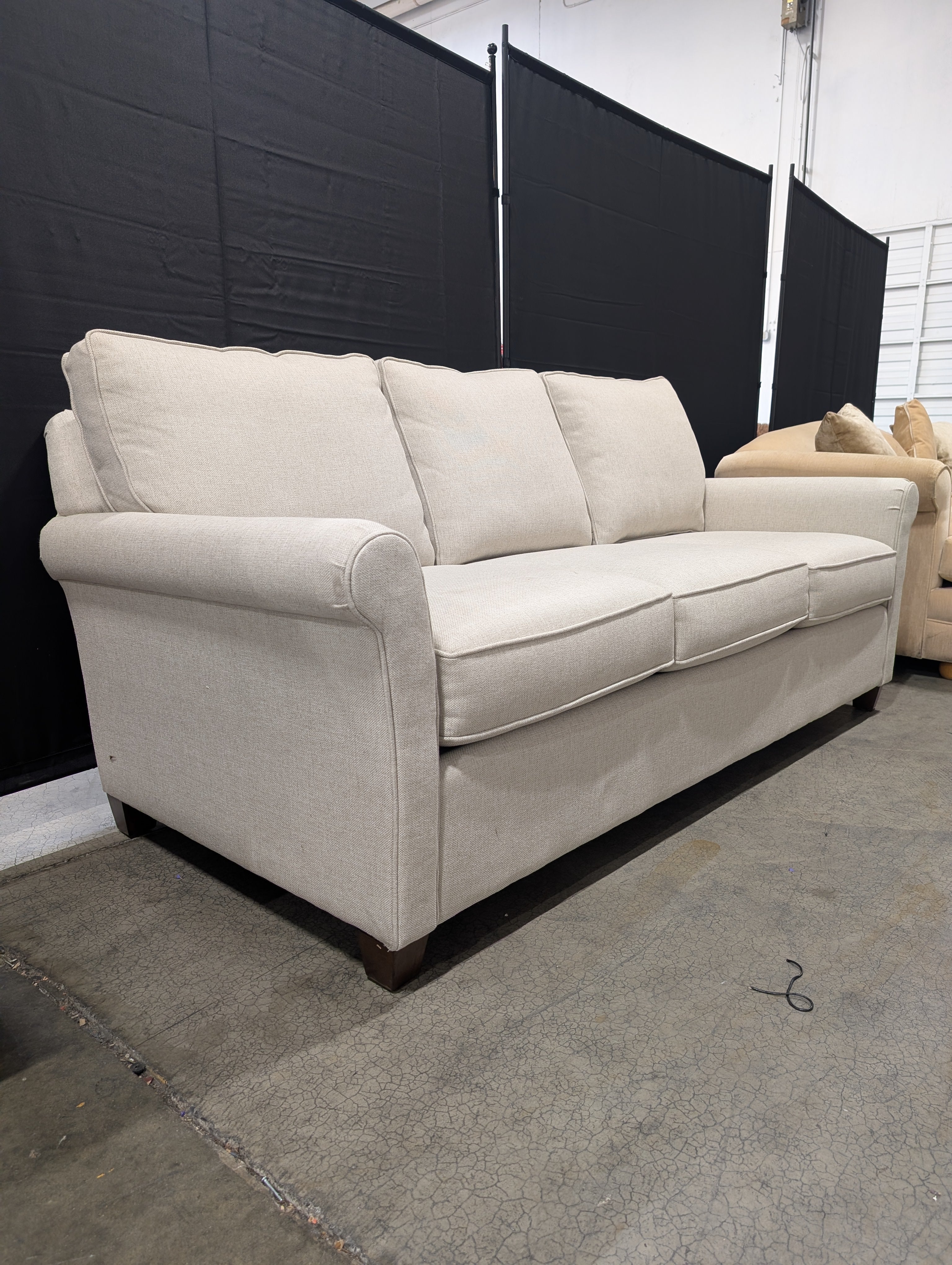 Neutral Toned Bassett Three-Seater Fabric Sofa