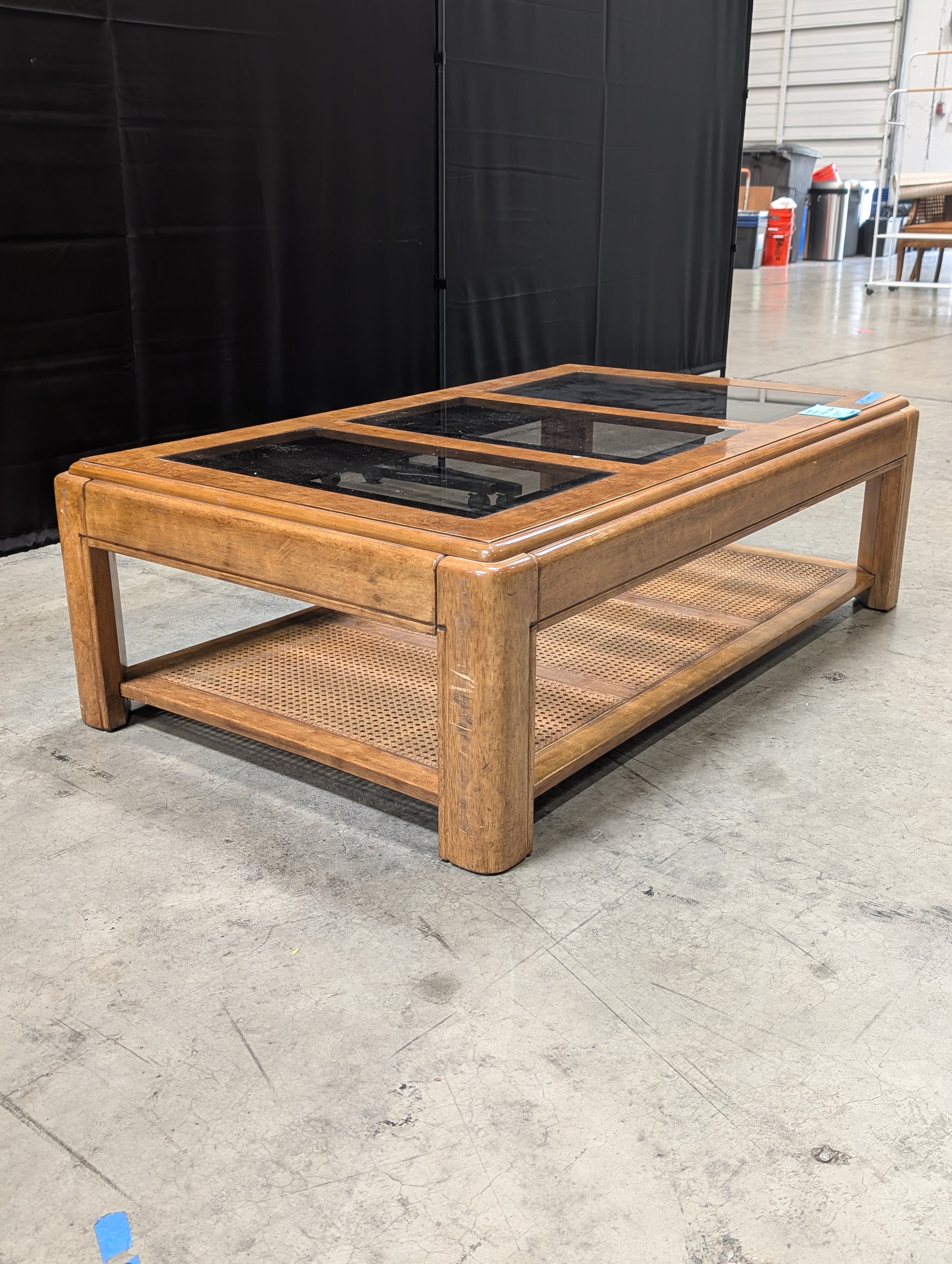 Vintage Style Burled Wood Coffee Table with Glass Top and Cane Accents