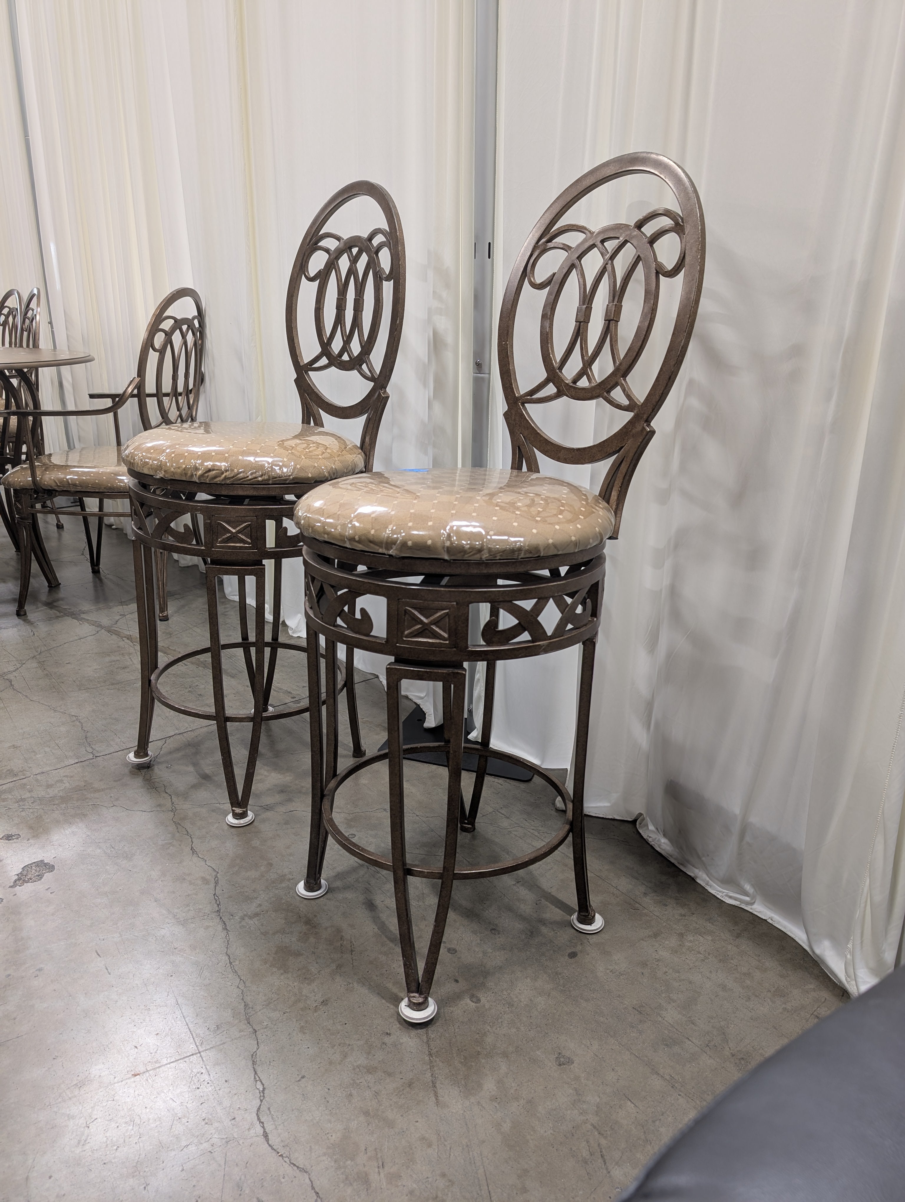 Pair of Ornate Dark Bronze Metal Bar Stools with Upholstered Seats