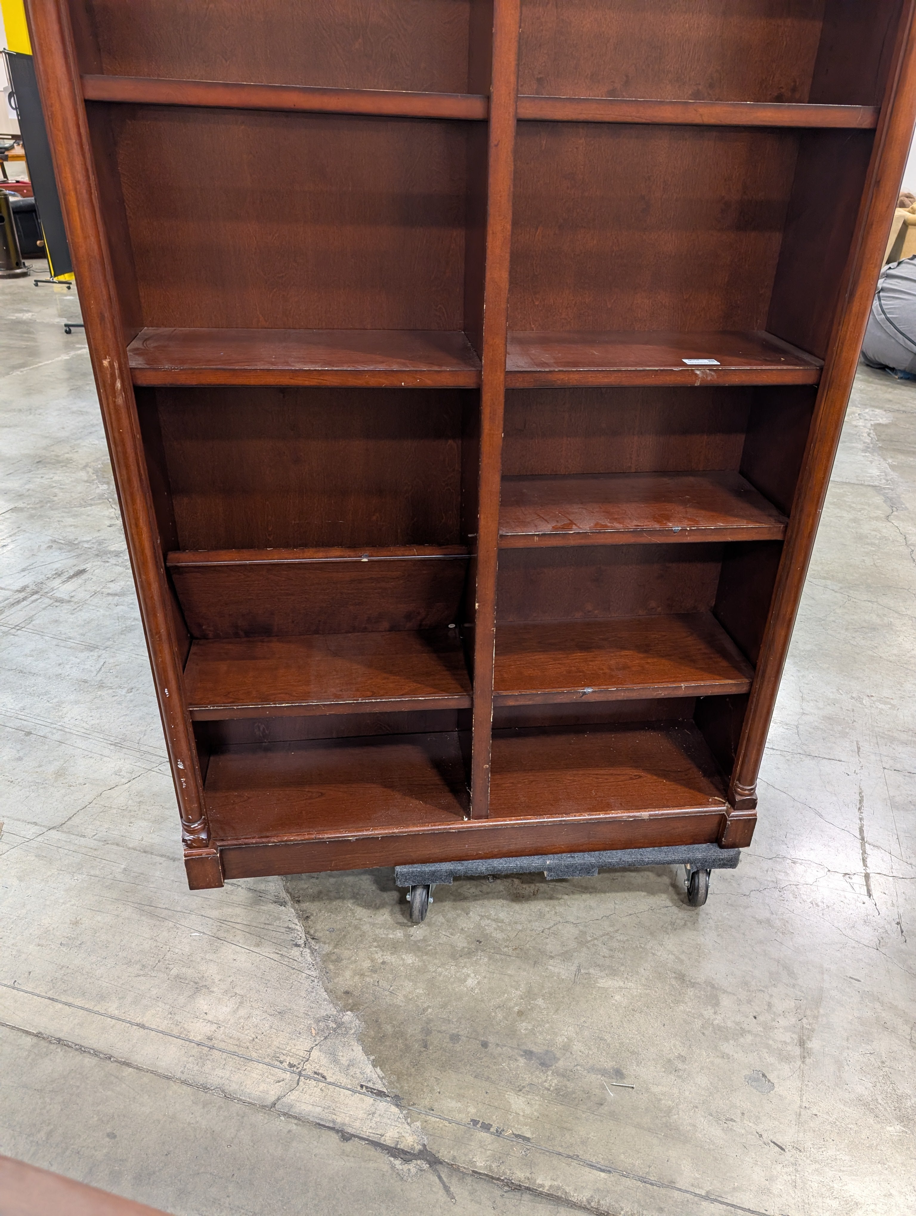 Traditional Dark Wood Bookcase with Arched Top Sections