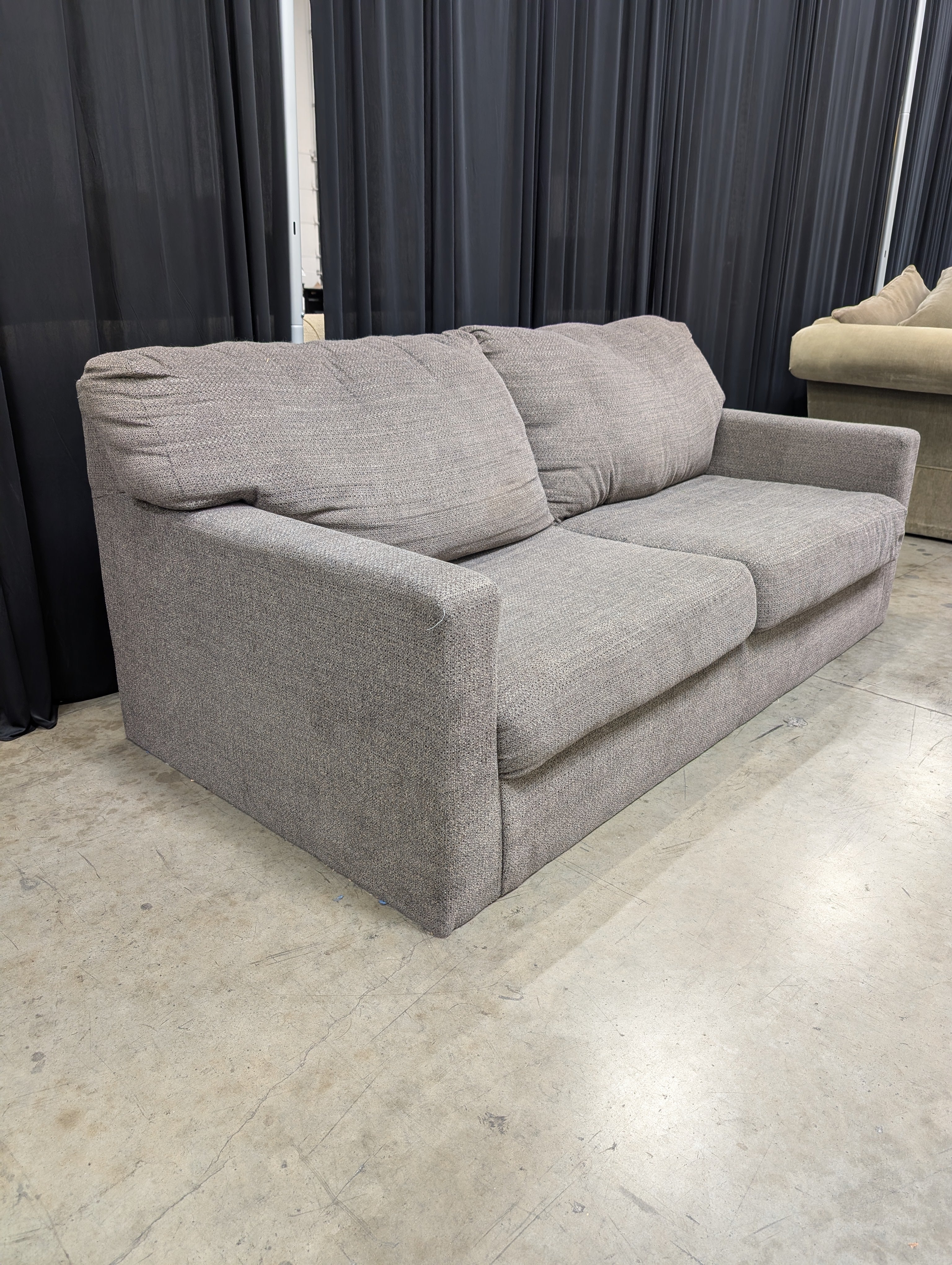 Grey Textured Fabric Two-Seater Couch with Track Arms