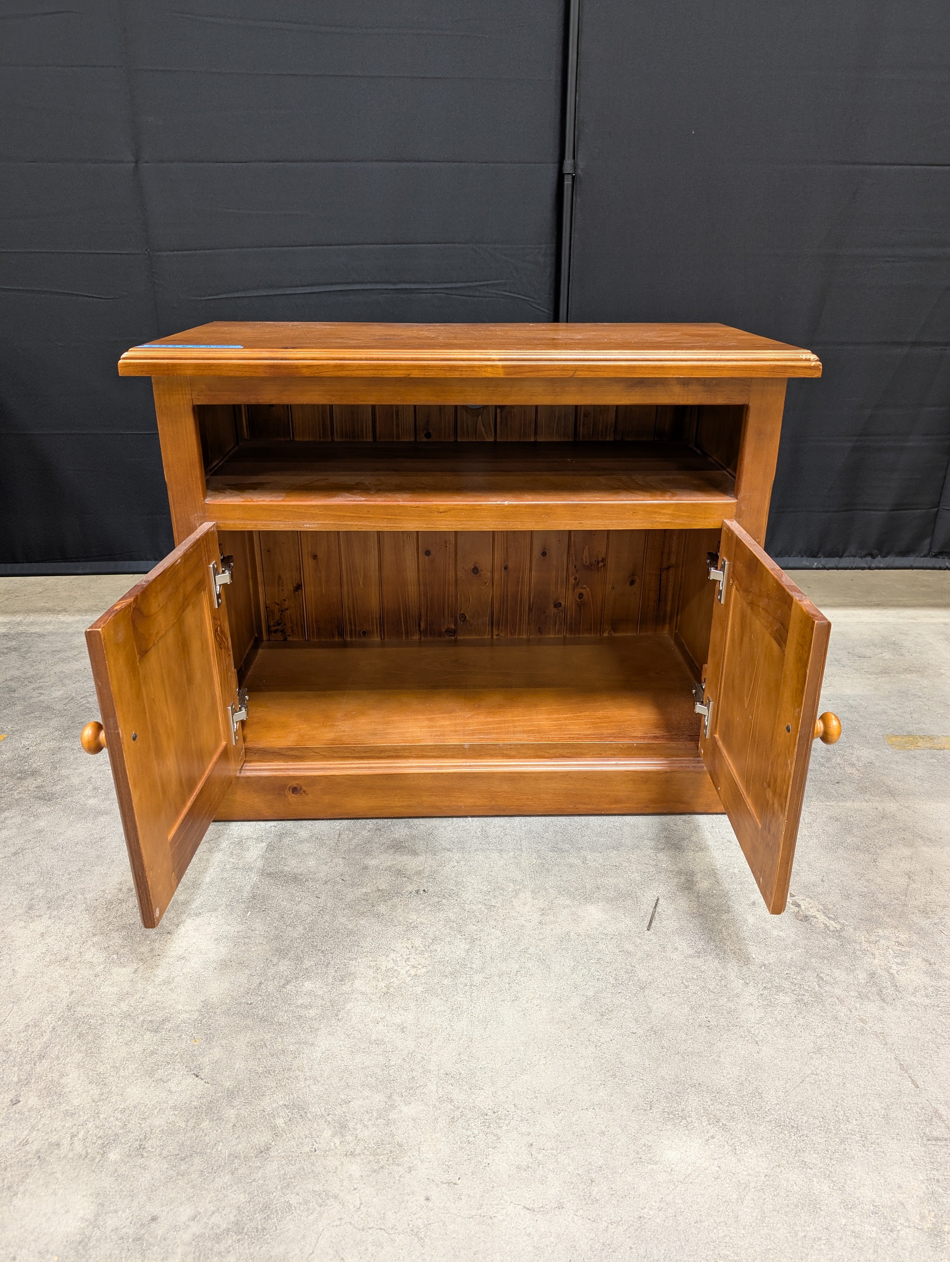 Brown Wood TV Stand with Cabinet Doors