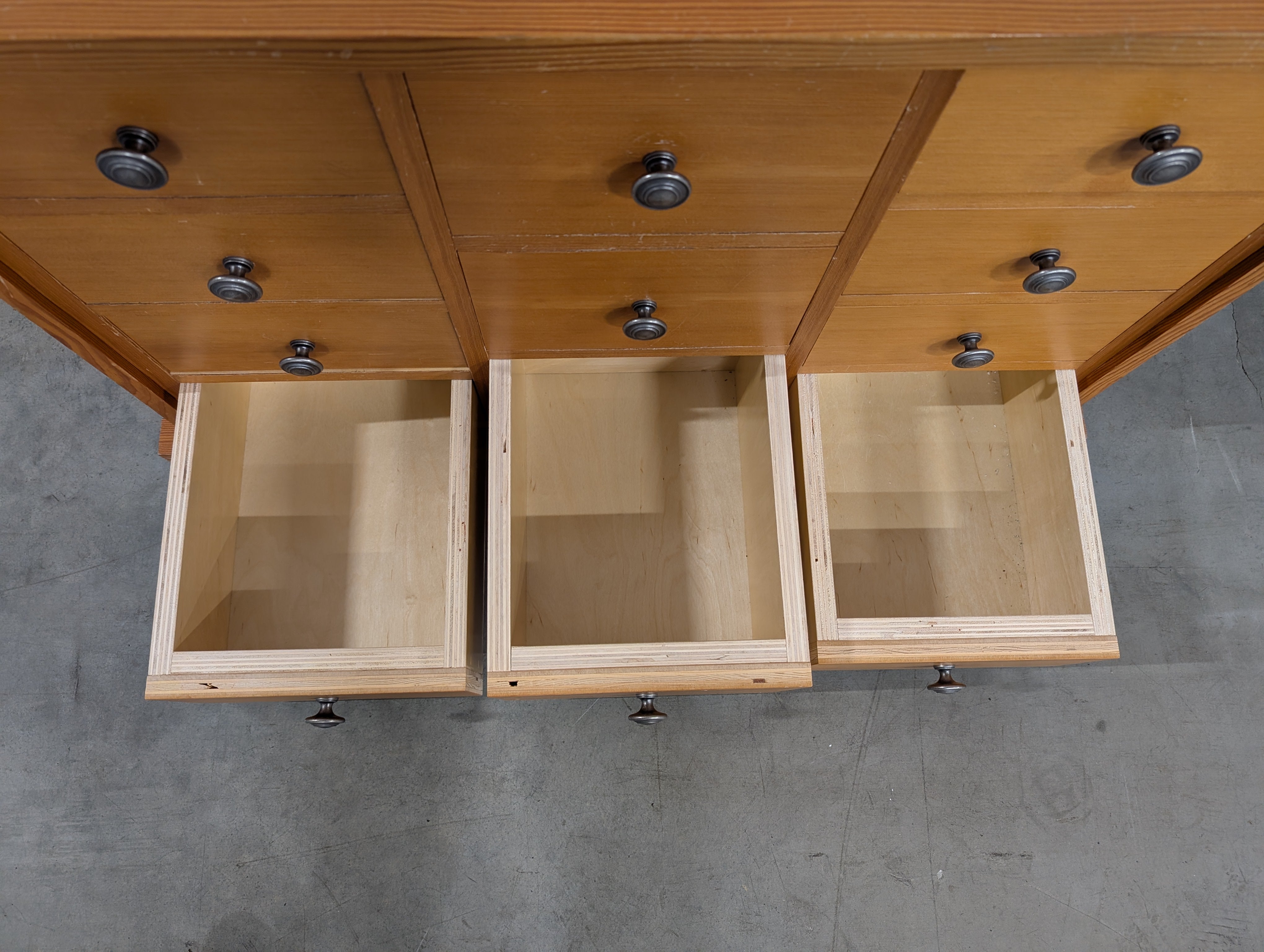 Warm Honey Wood Nine-Drawer Storage Chest
