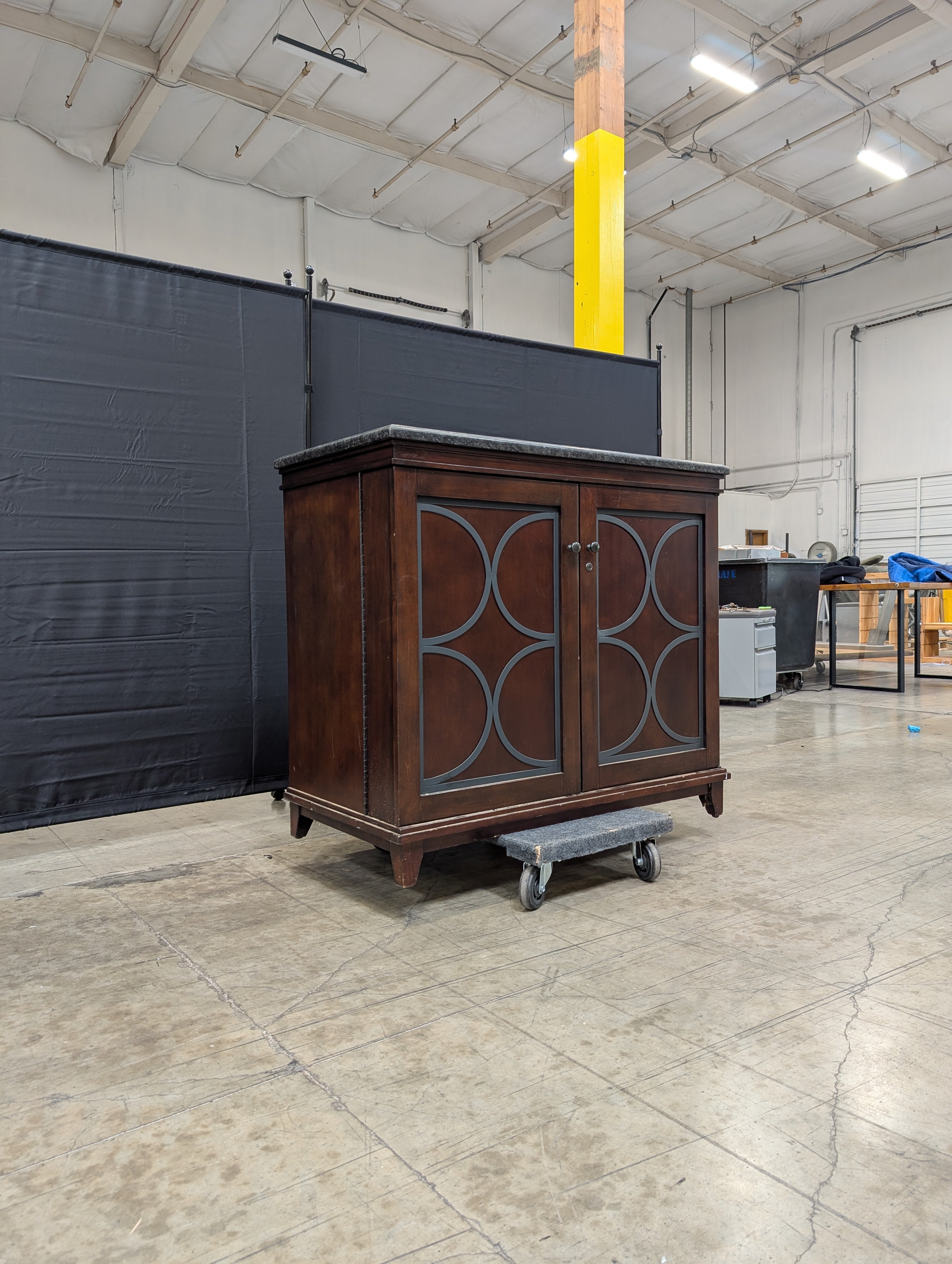 Dark Wood Wine Storage Cabinet with Granite Top and Decorative Doors