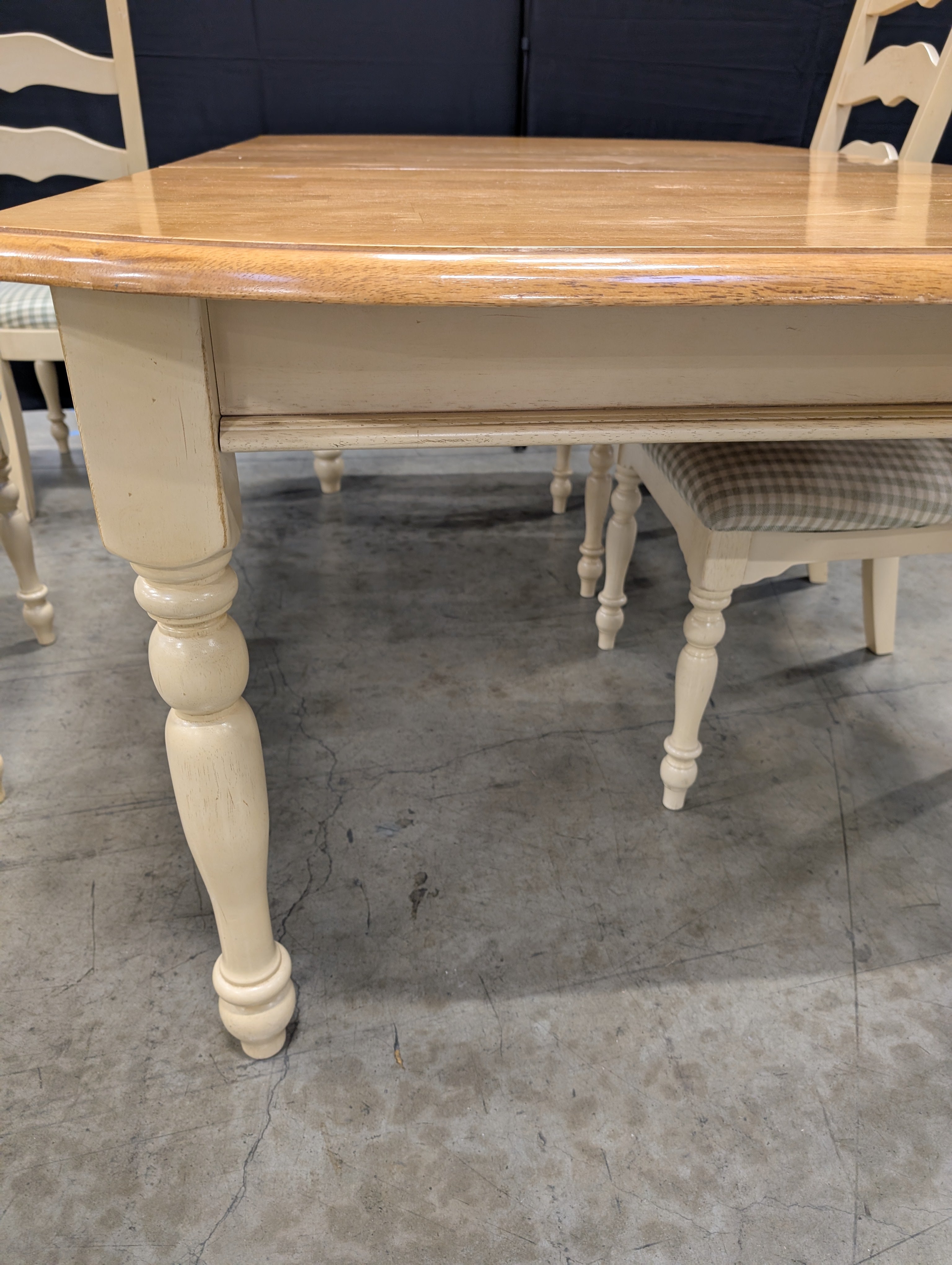 Rustic Wood Dining Table with Four Ladder-Back Chairs