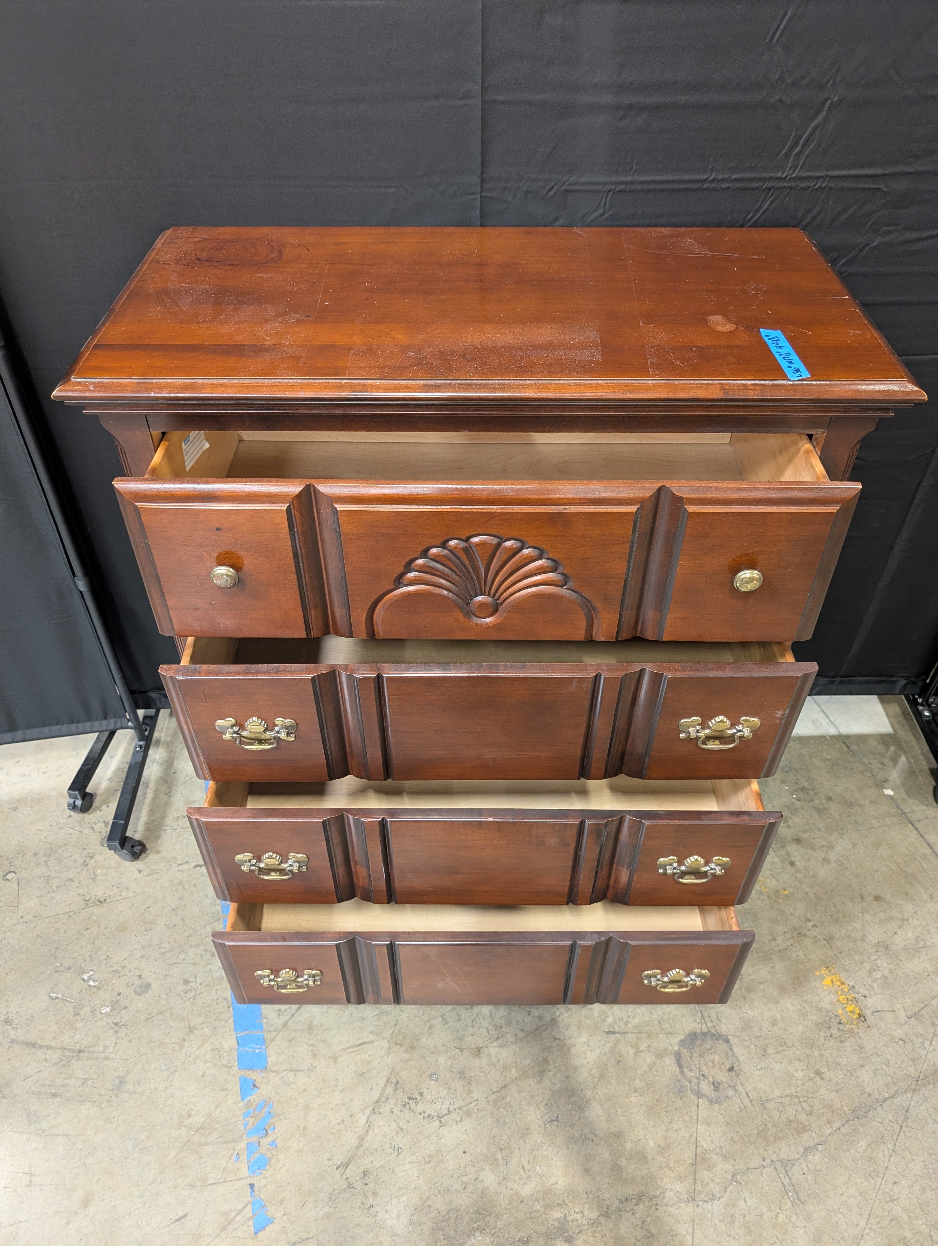 Traditional Dark Wood Dresser with Ornate Hardware