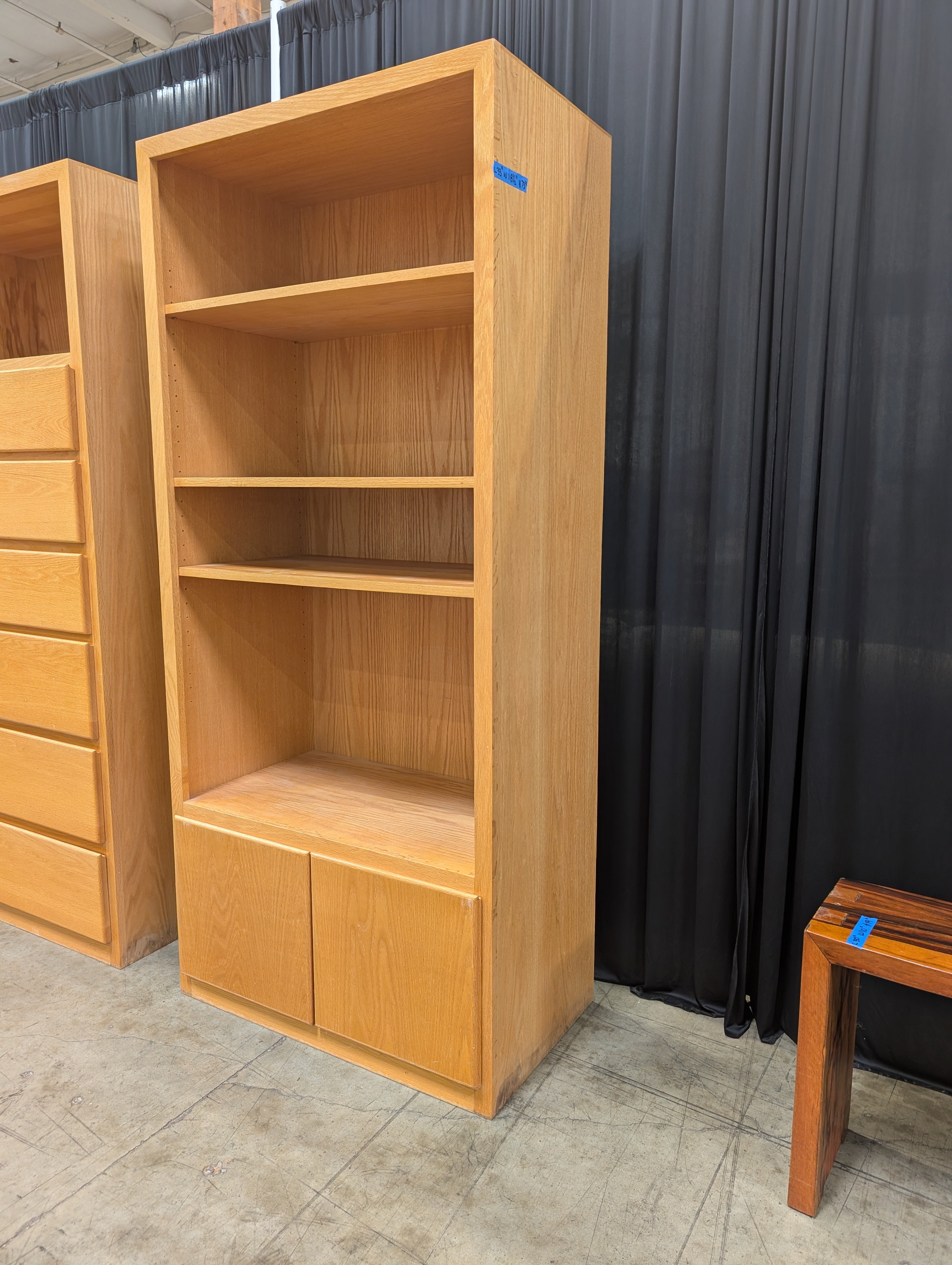 Light Brown Wood Bookcase with Three Shelves and Lower Cabinets