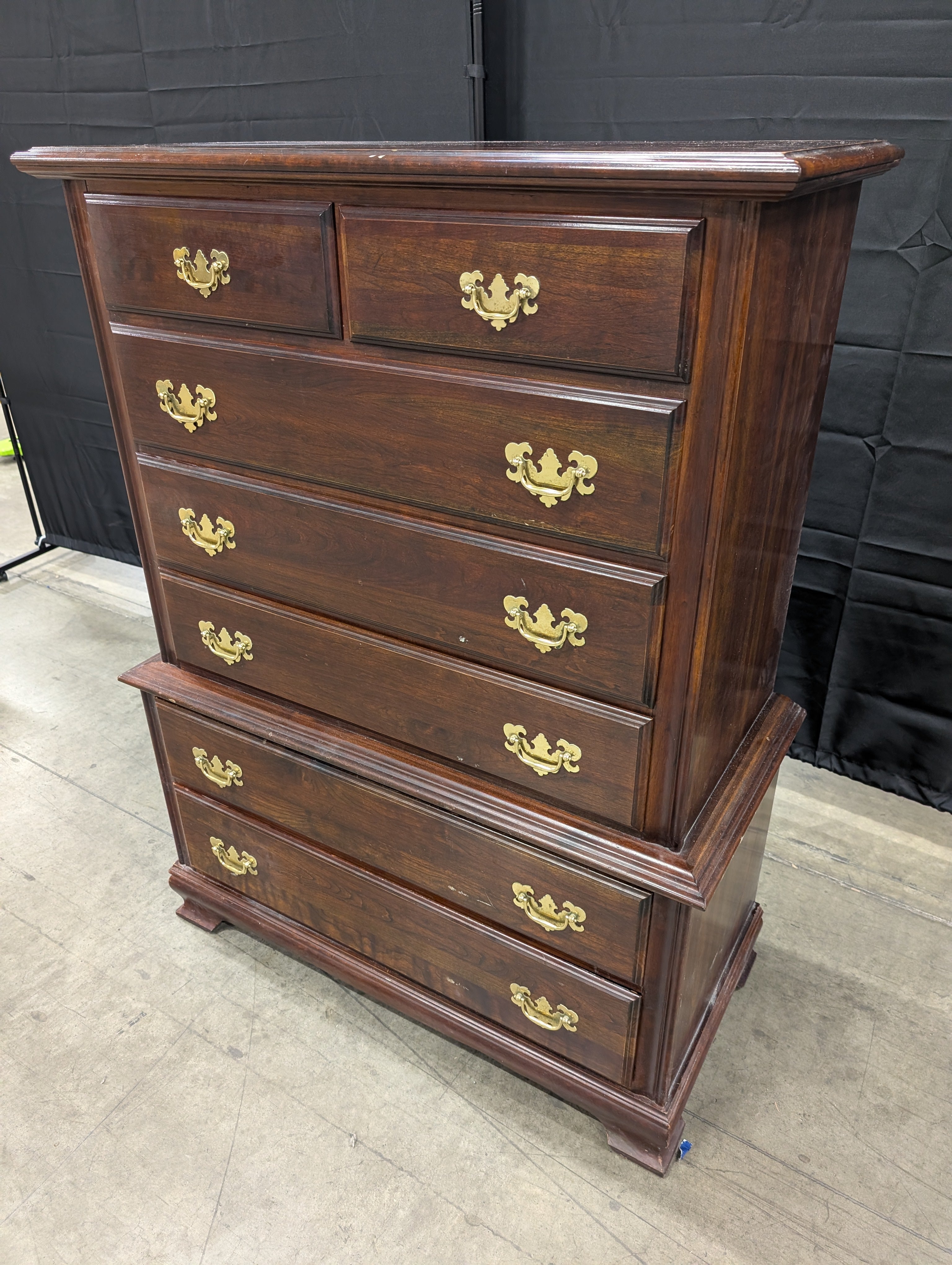 Traditional Dark Wood Chest of Drawers with Ornate Brass Pulls