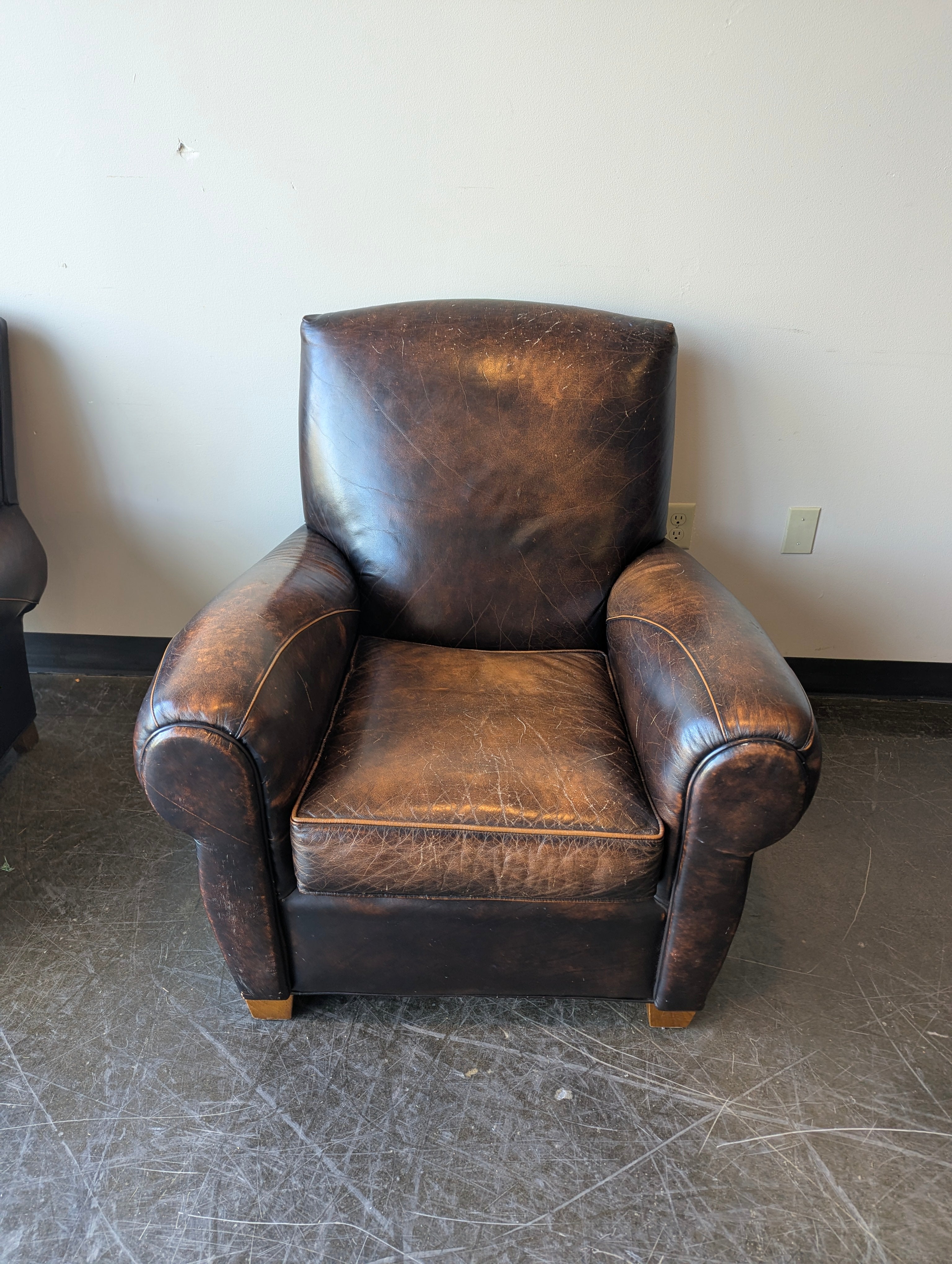 Distressed Brown Leather Club Chair with Rolled Arms