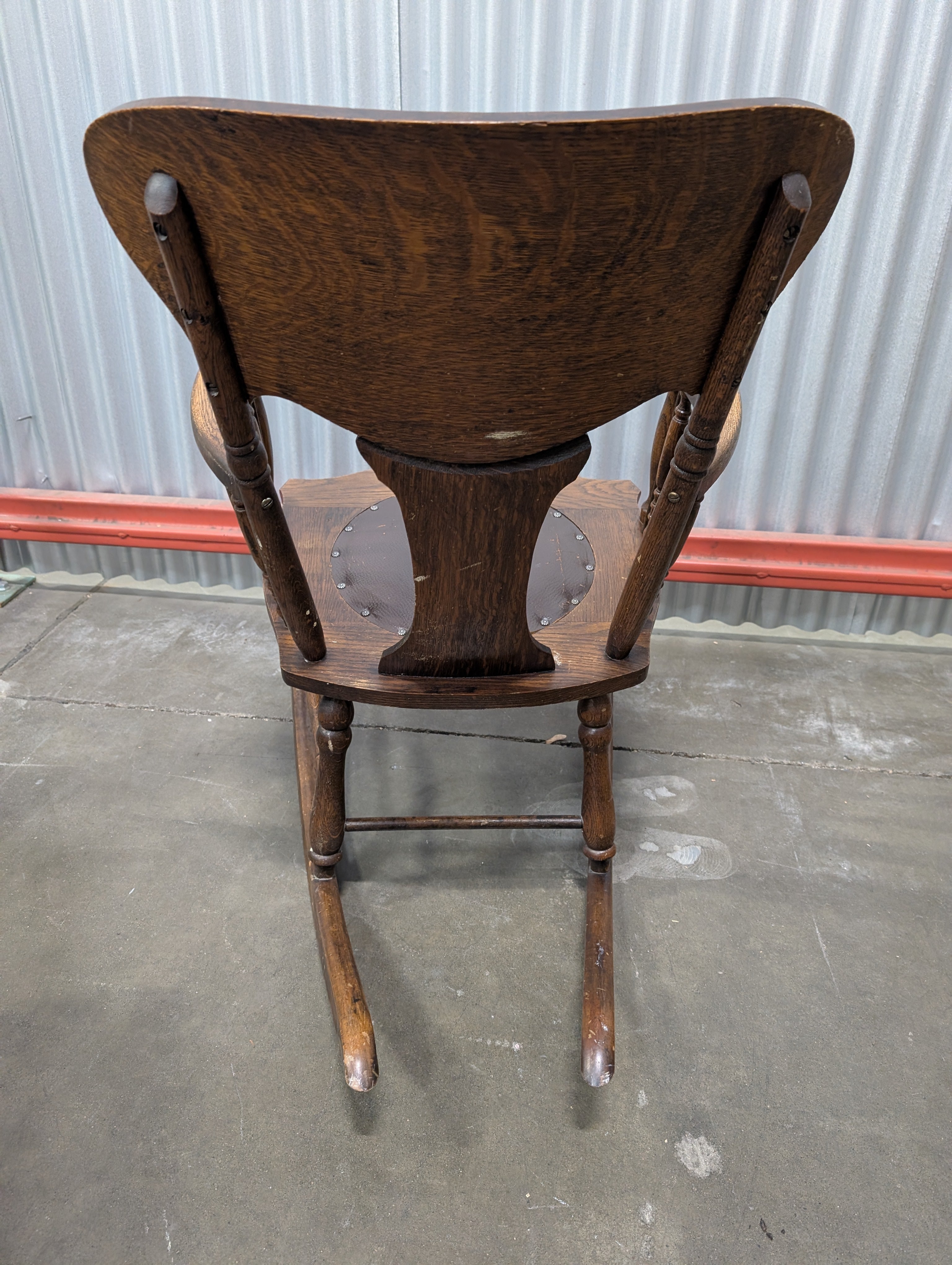Antique Dark Wood Rocking Chair with Leather Seat