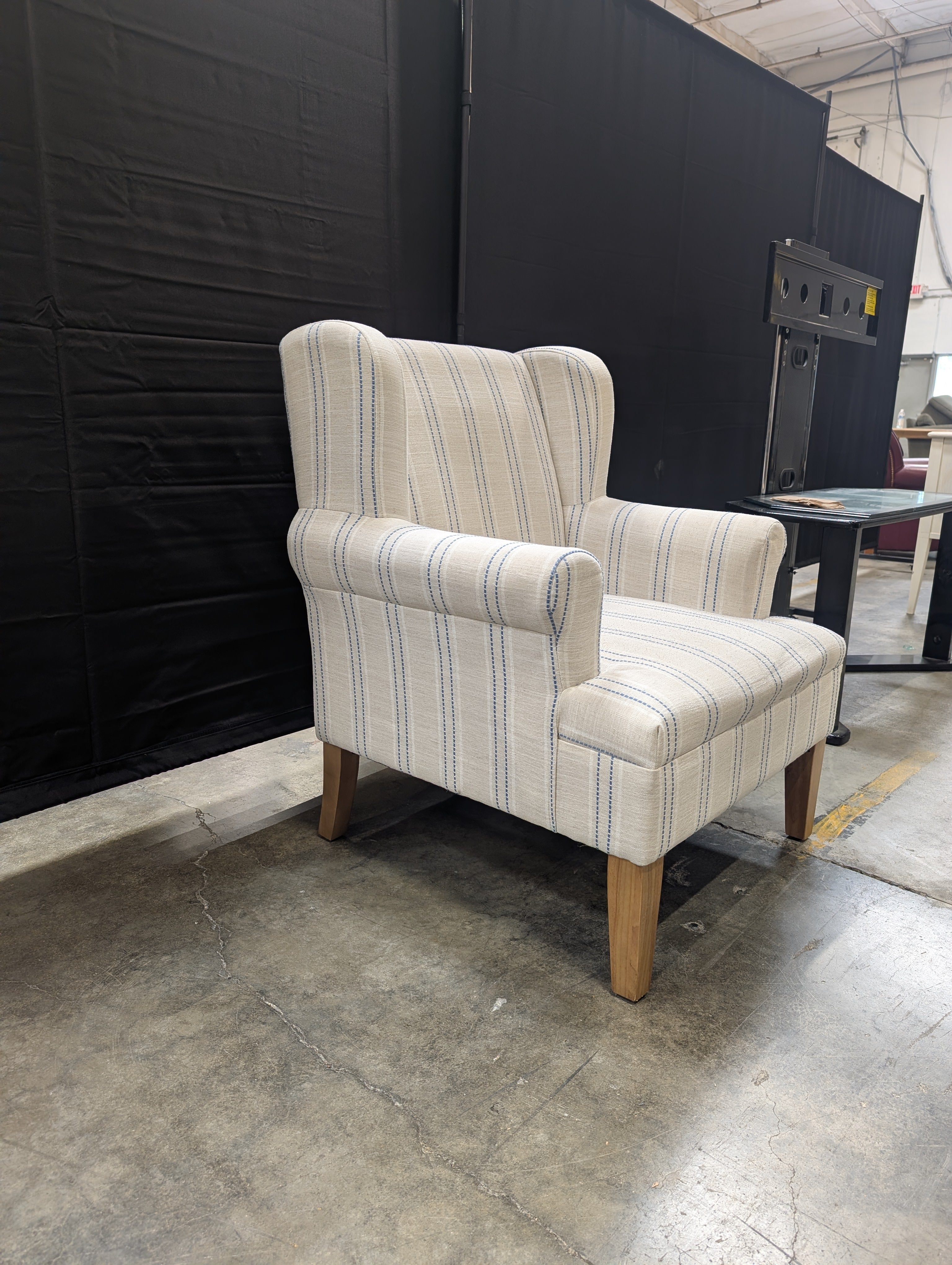 Upholstered Wingback Armchair with Blue Stripes