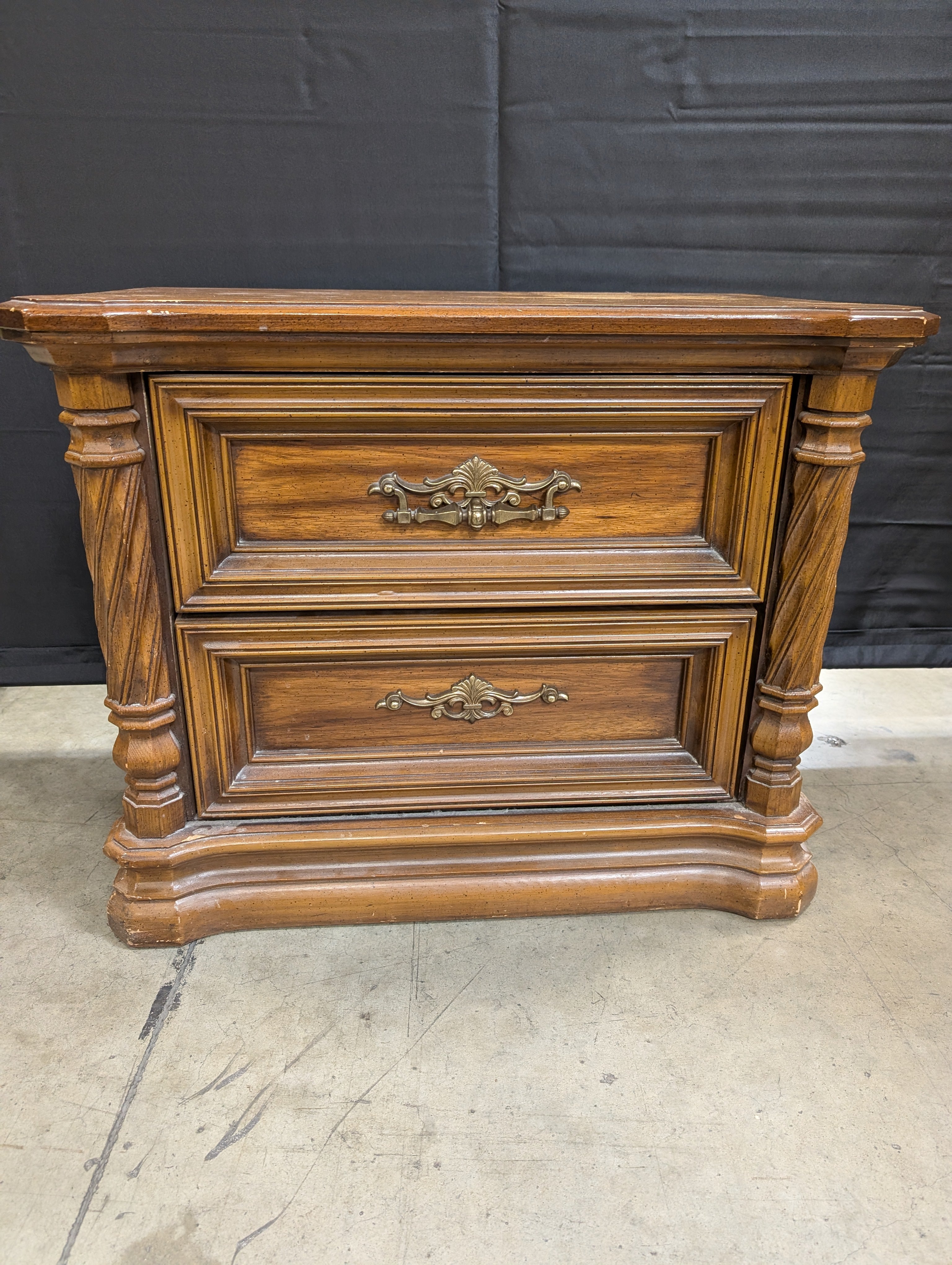 Vintage Wooden Nightstand with Two Drawers, Ornate Pulls & Carved Accents