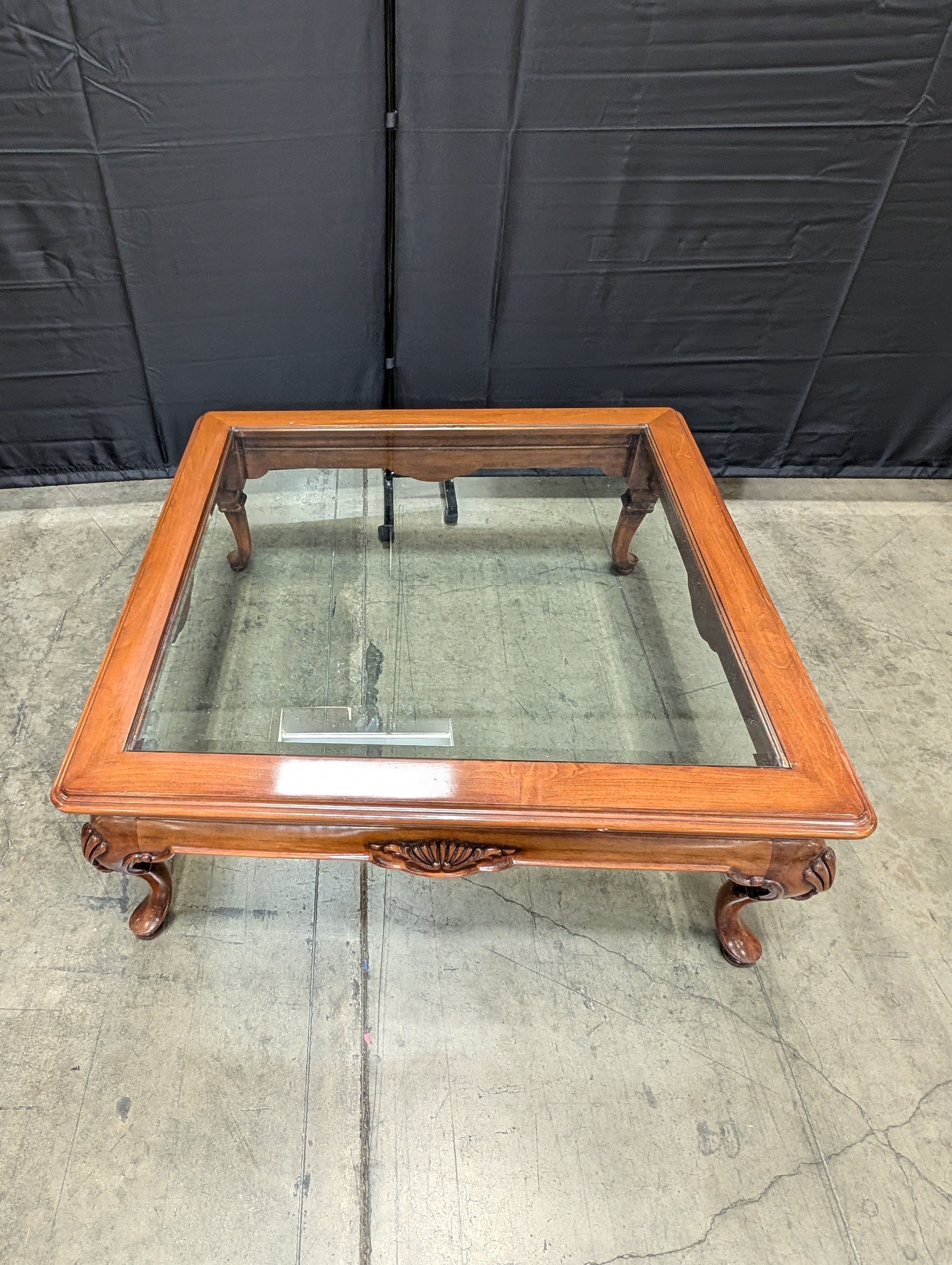 Traditional Carved Wood and Glass Top Coffee Table