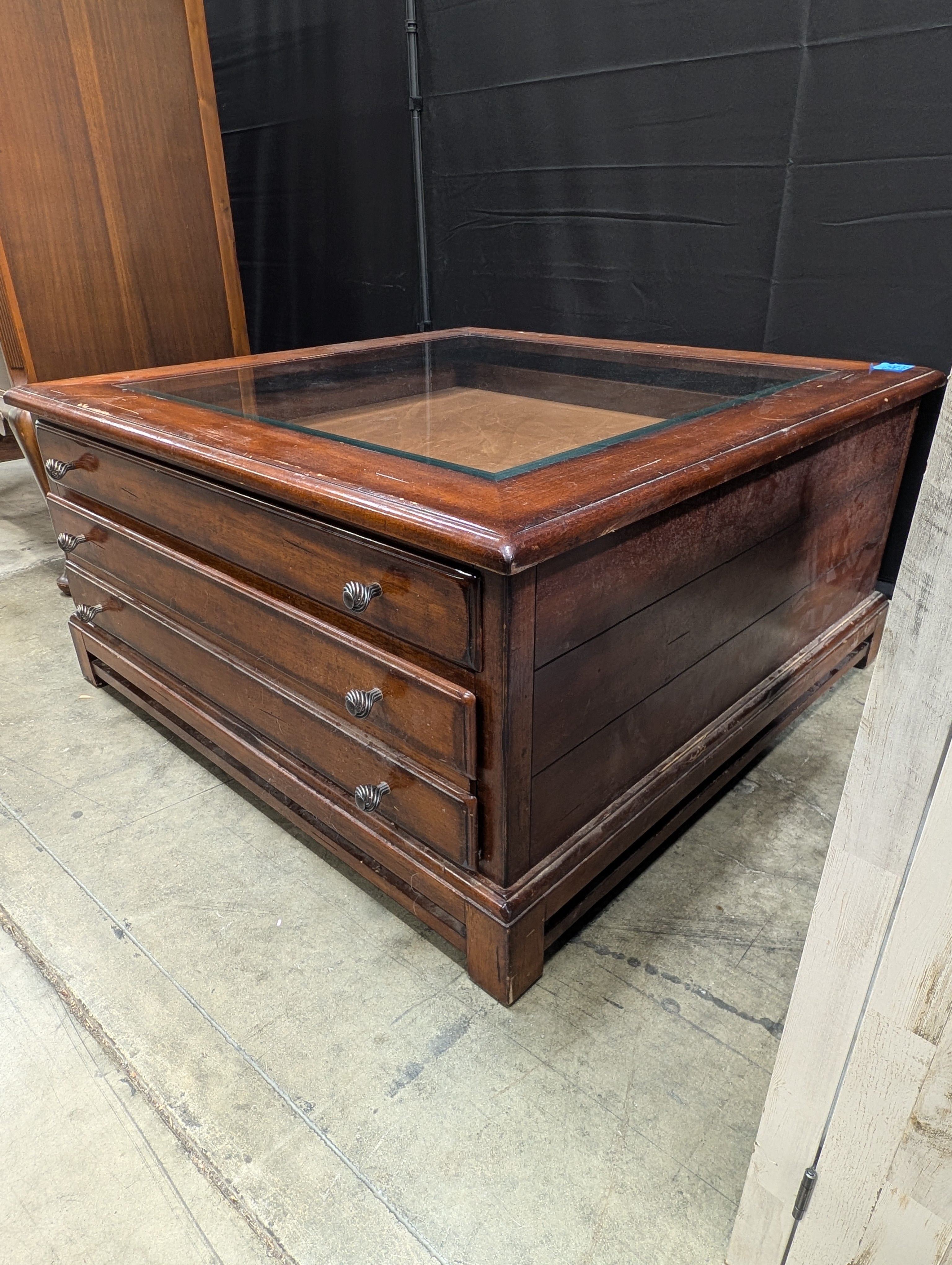 Solid Wood  Alexander Julian Glass Top Display Coffee Table with Storage Drawer