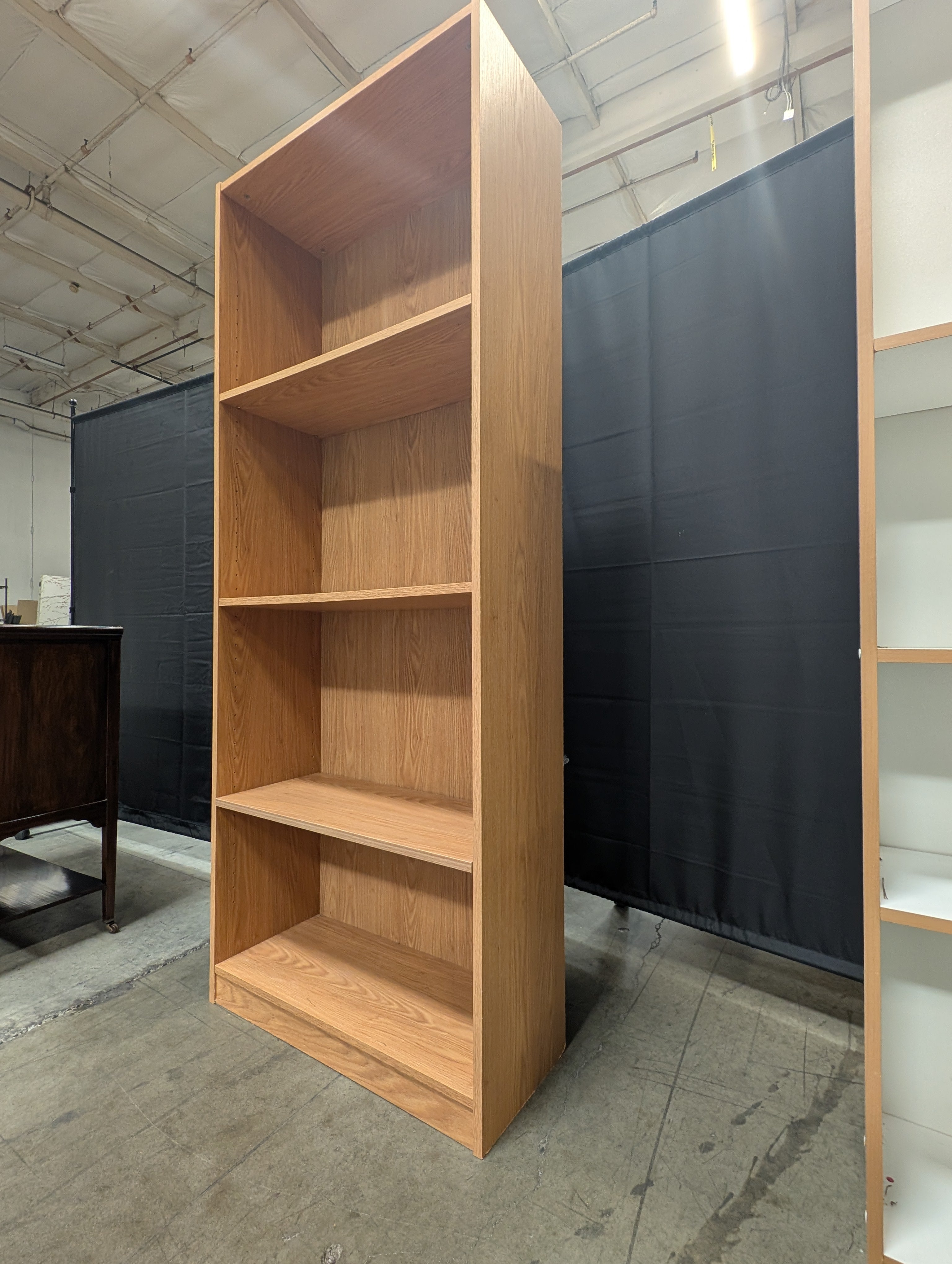 Versatile Light Brown Bookcase with Adjustable Shelving